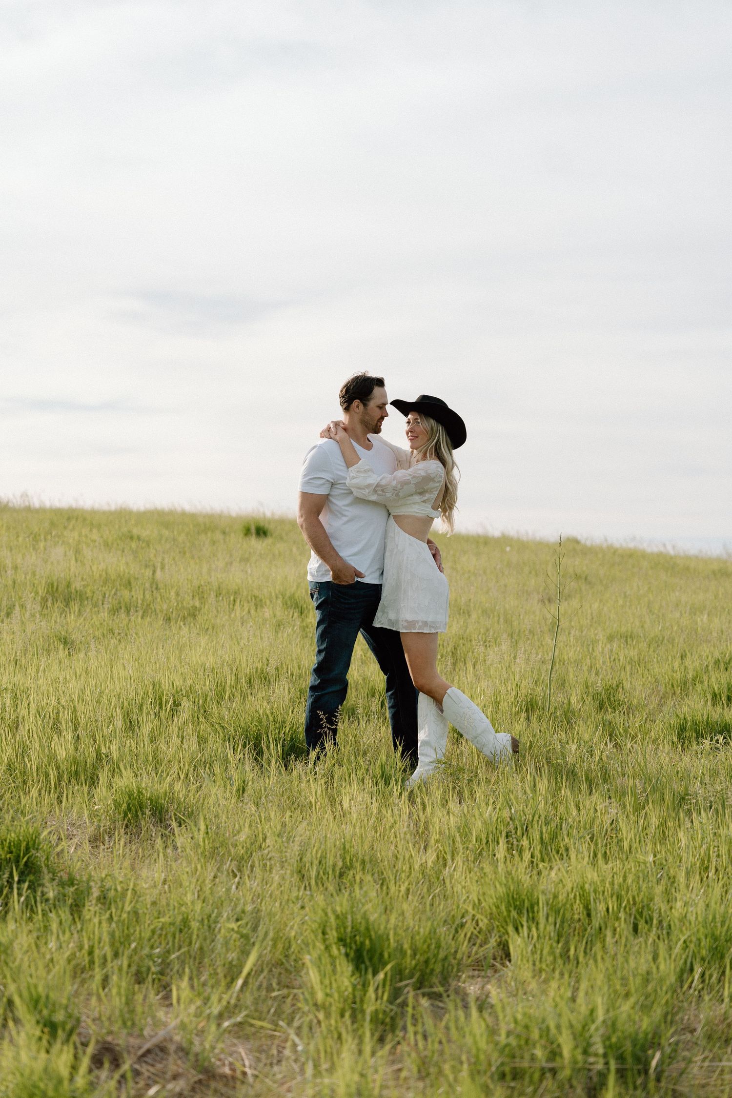 Beautiful open field, dusk, couple session