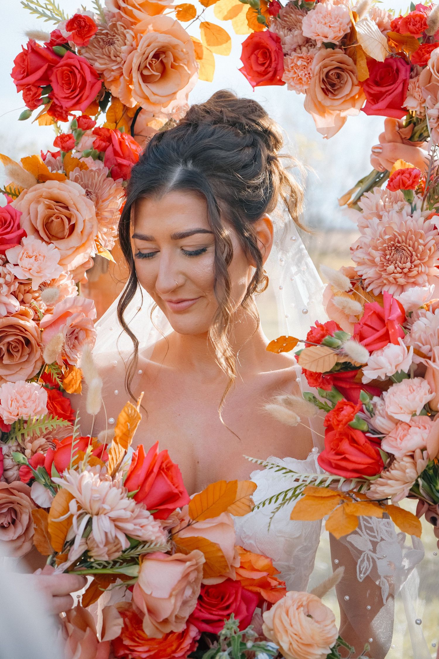 wisconsin bride, flowers framing face, beautiful rose colors
