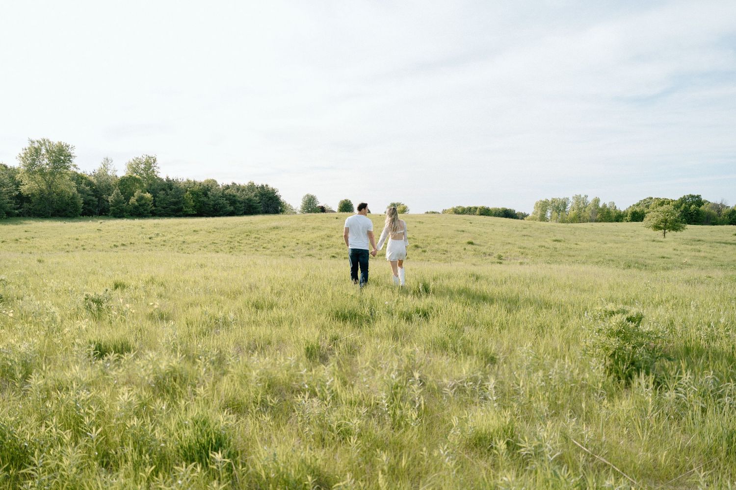 Beautiful open field, dusk, couple session