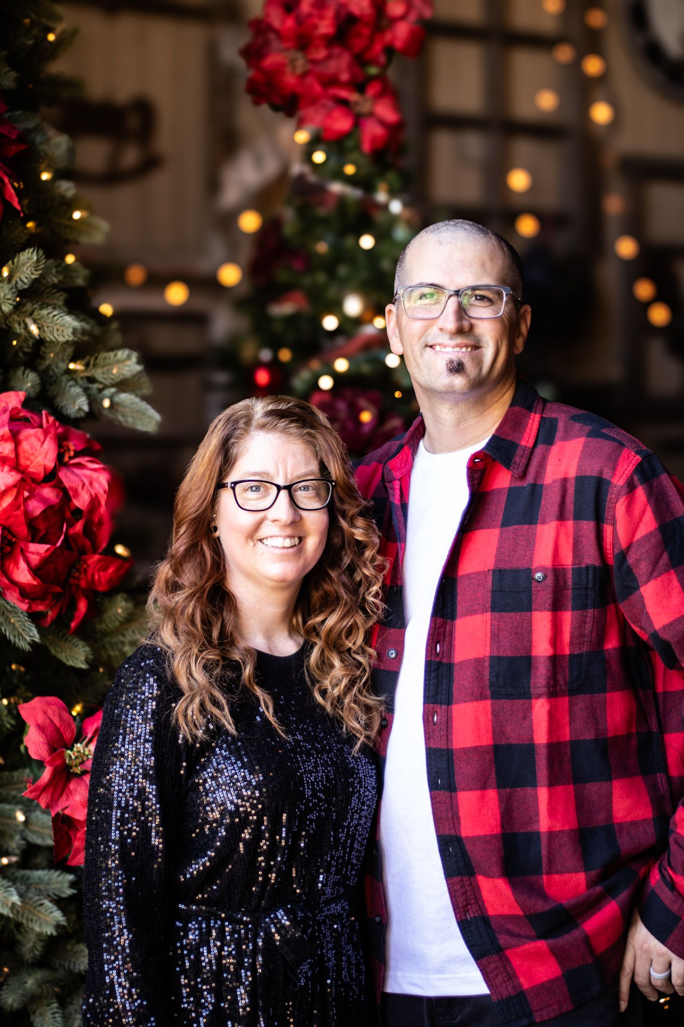 Christmas couple portraits at West 12 Ranch in Lodi CA with rustic holiday décor and warm natural light