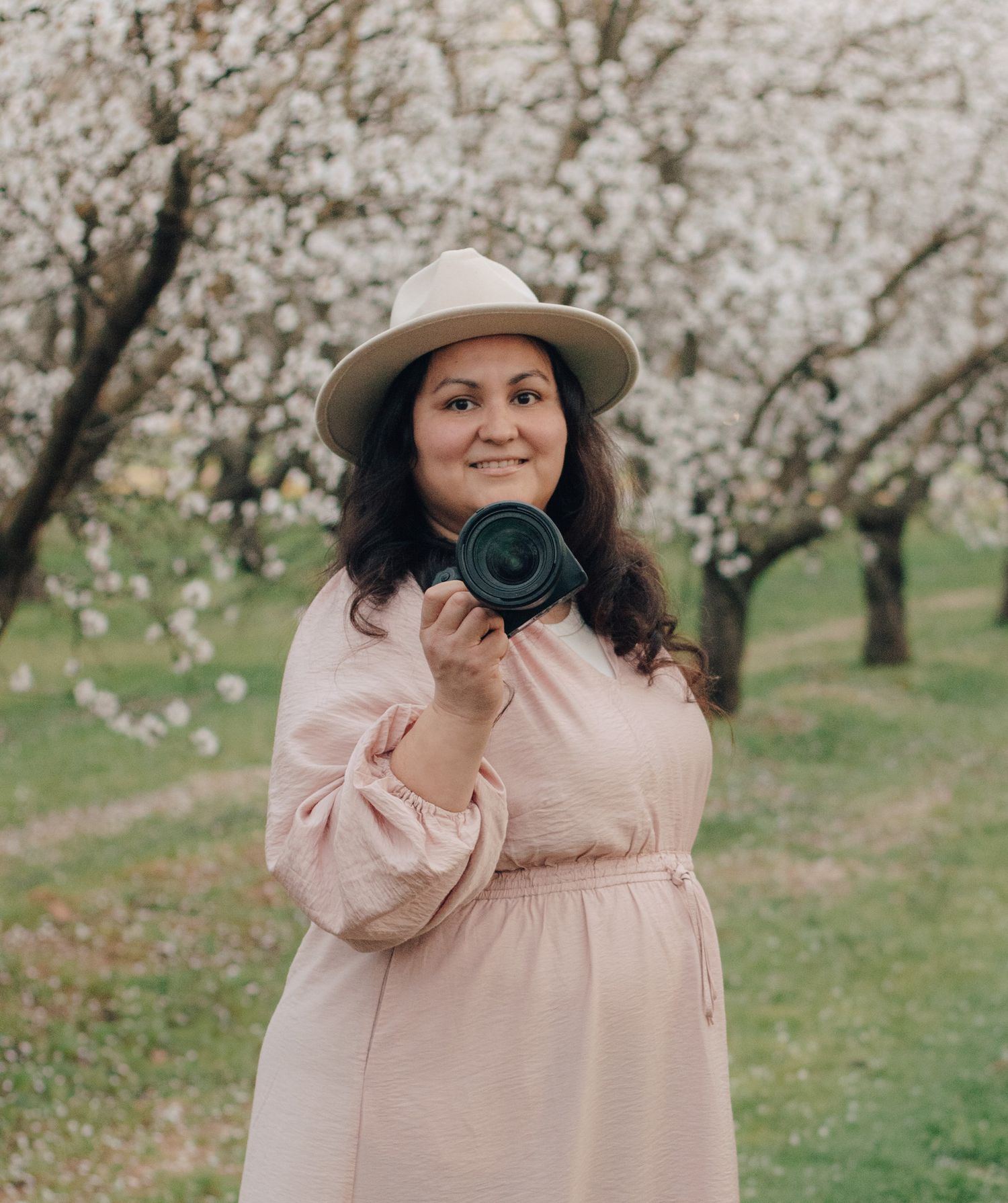 Almond blossom portraits by a Northern California and Bay Area photographer capturing soft natural light and storytelling movement.