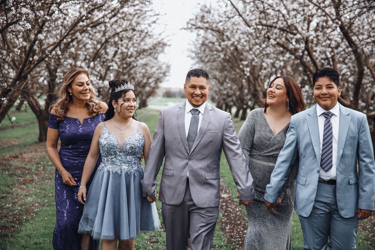 Almond blossom portraits in Modesto CA captured during peak bloom with soft natural light and storytelling movemen