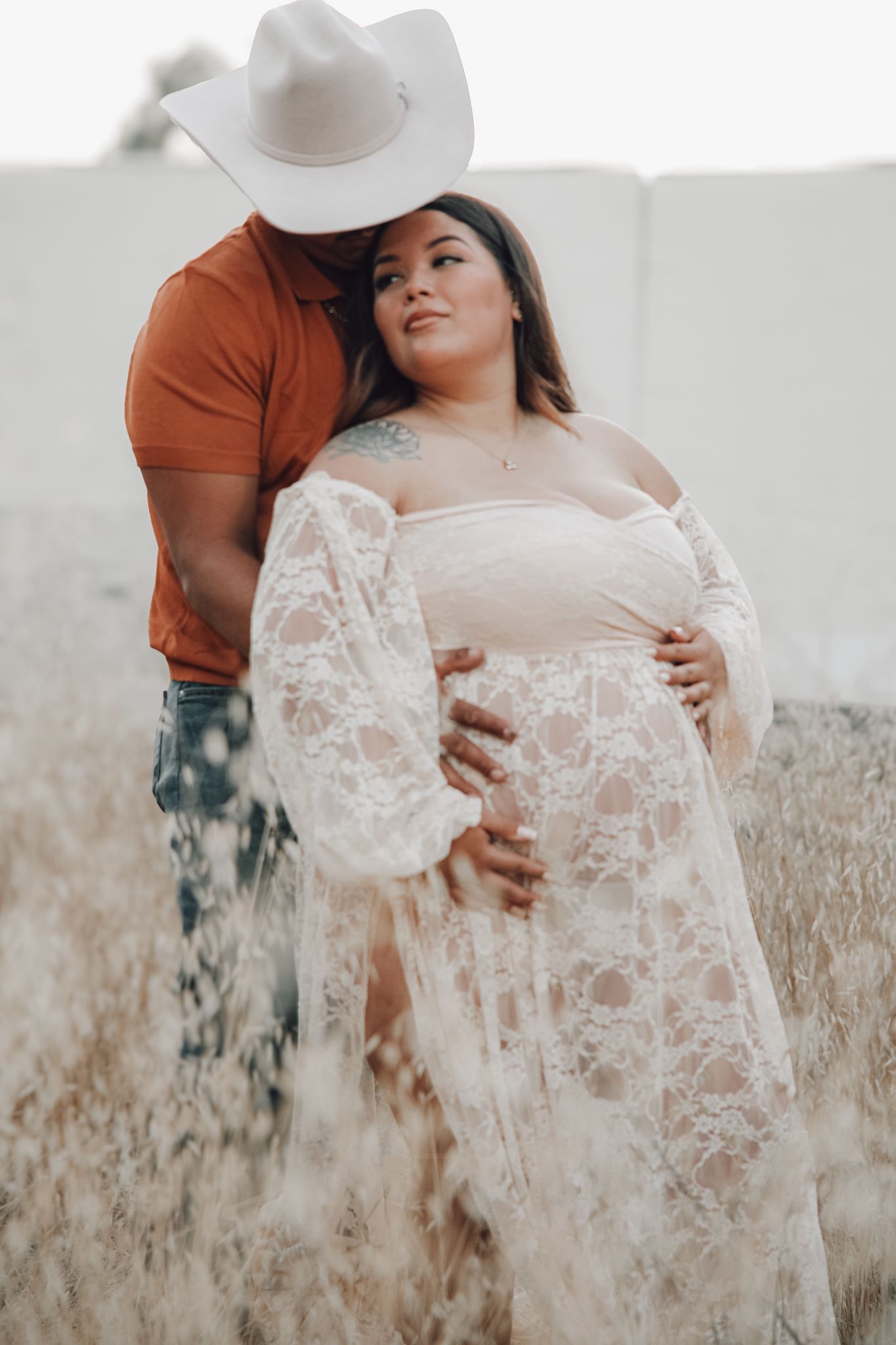 Boho‑inspired maternity photos at West 12 Ranch Studio Lodi CA with rustic backdrops, flowing wardrobe, and soft golden light.