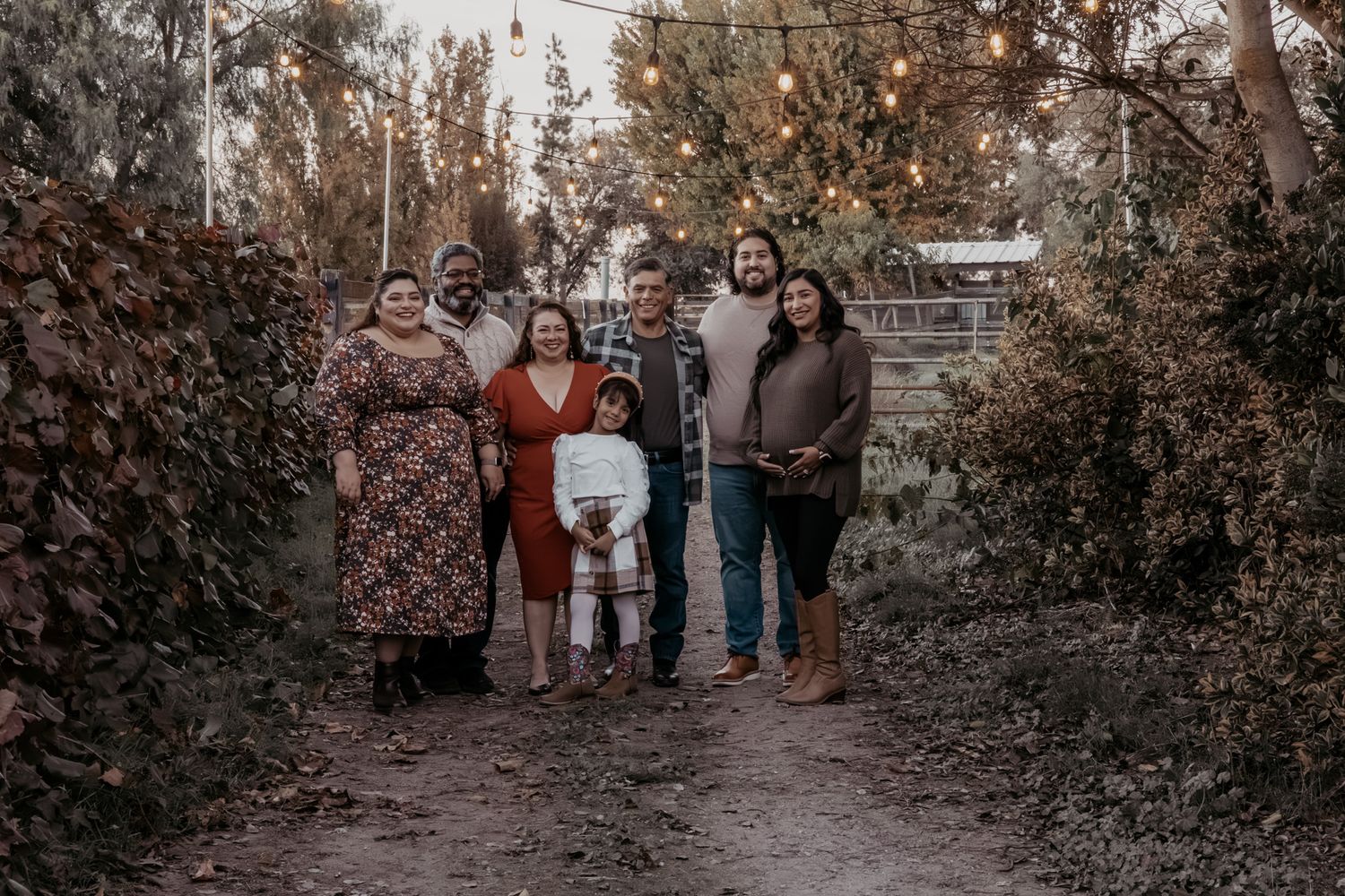 Generational family holiday portrait capturing multiple generations celebrating together