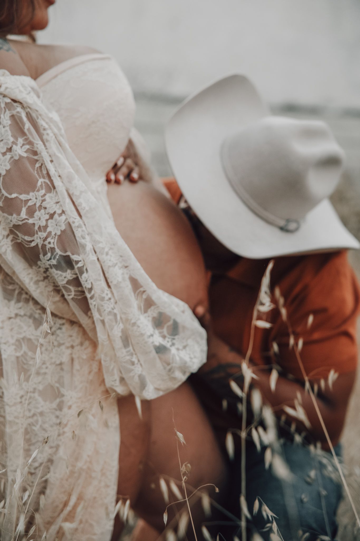 Rustic boho maternity session at West 12 Ranch Studio in Lodi CA captured during golden hour with soft natural light and earthy textures.