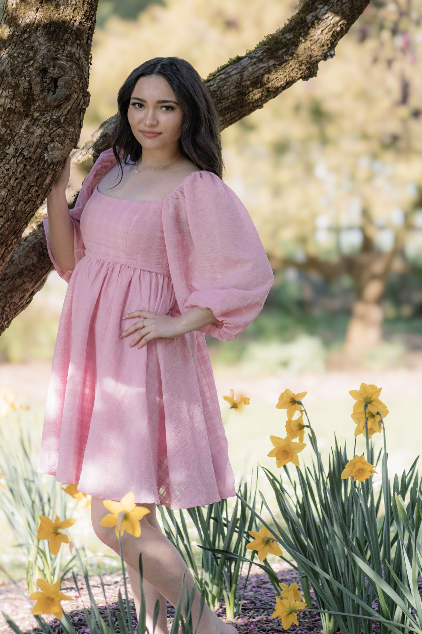 Spring senior portrait at the San Francisco Botanical Garden with soft natural light and blooming florals