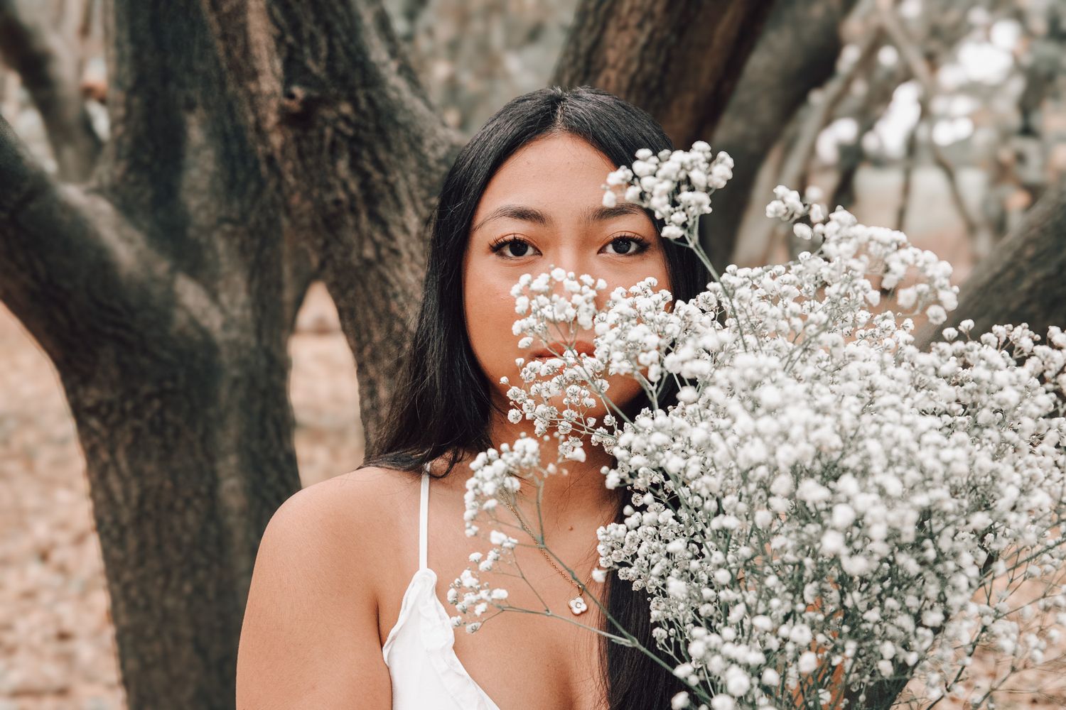 Senior portraits at Lodi Lake nature trail captured outdoors in soft natural light with personality‑driven posing