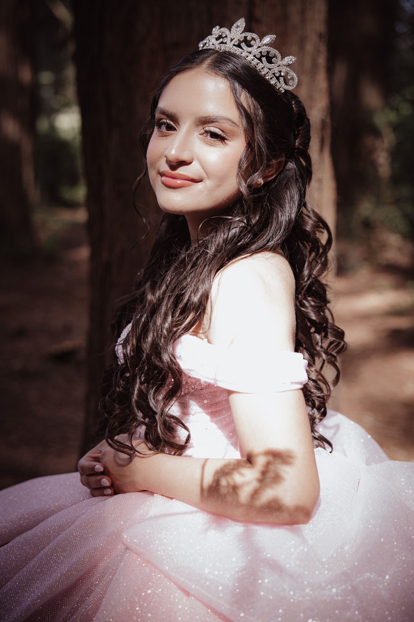 Pre‑quince portrait session in the Oakland Redwoods with soft natural light and a dreamy forest backdrop.