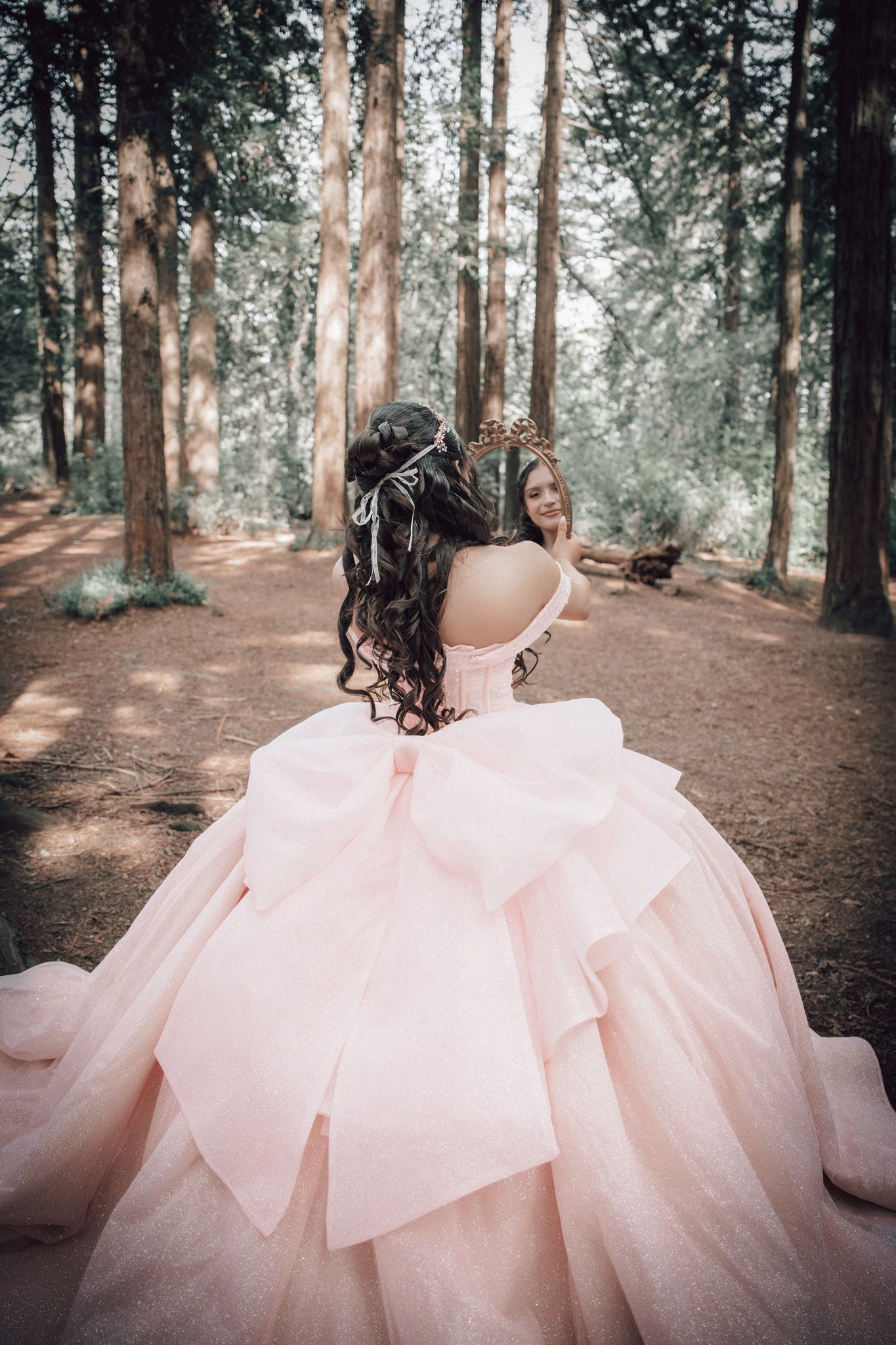 Pre‑quince portrait in the Oakland Redwoods with soft light and tall redwood trees