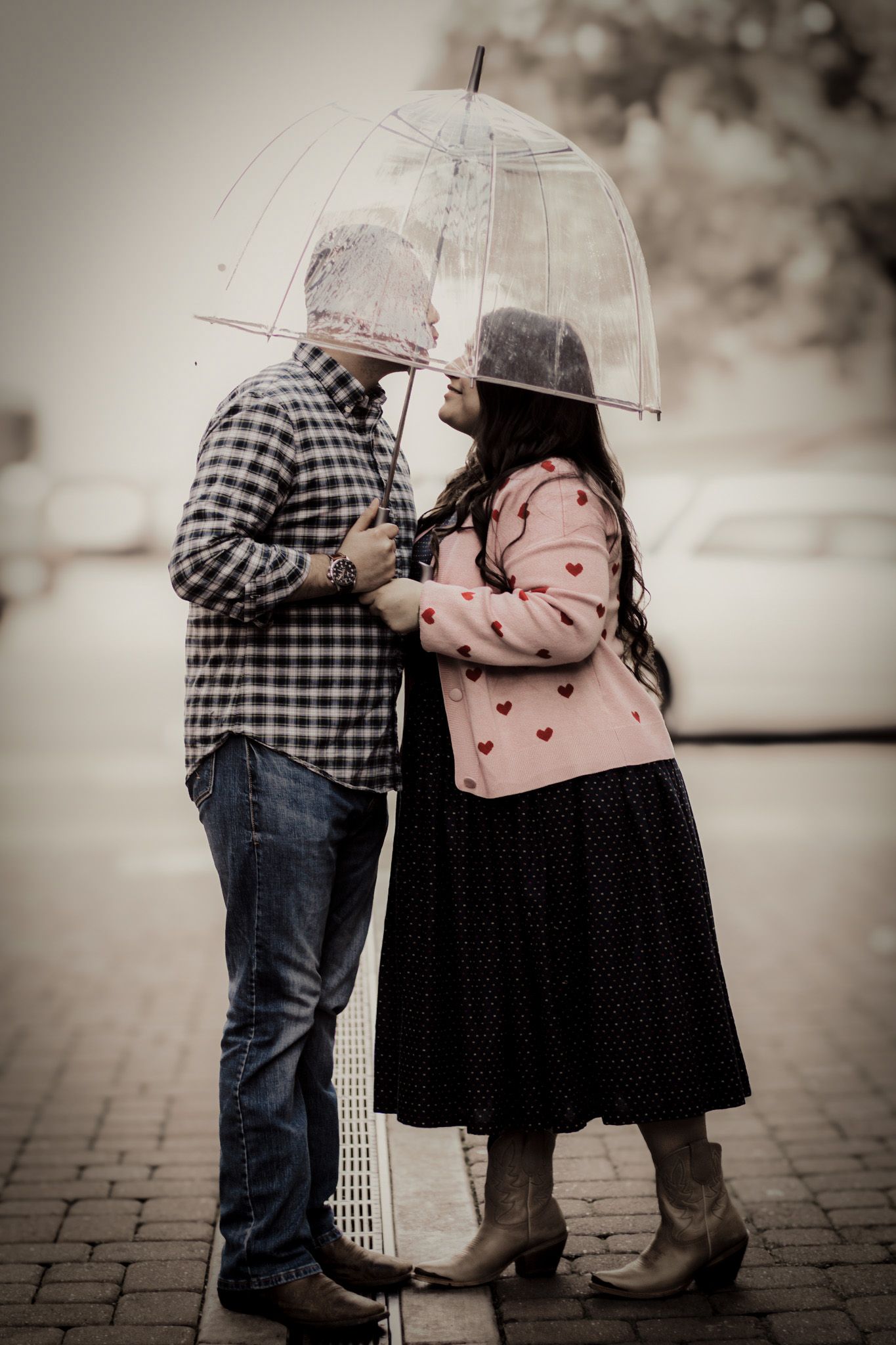Couple strolling through downtown Lodi during a Valentine’s date, captured in warm natural light with candid, romantic movement