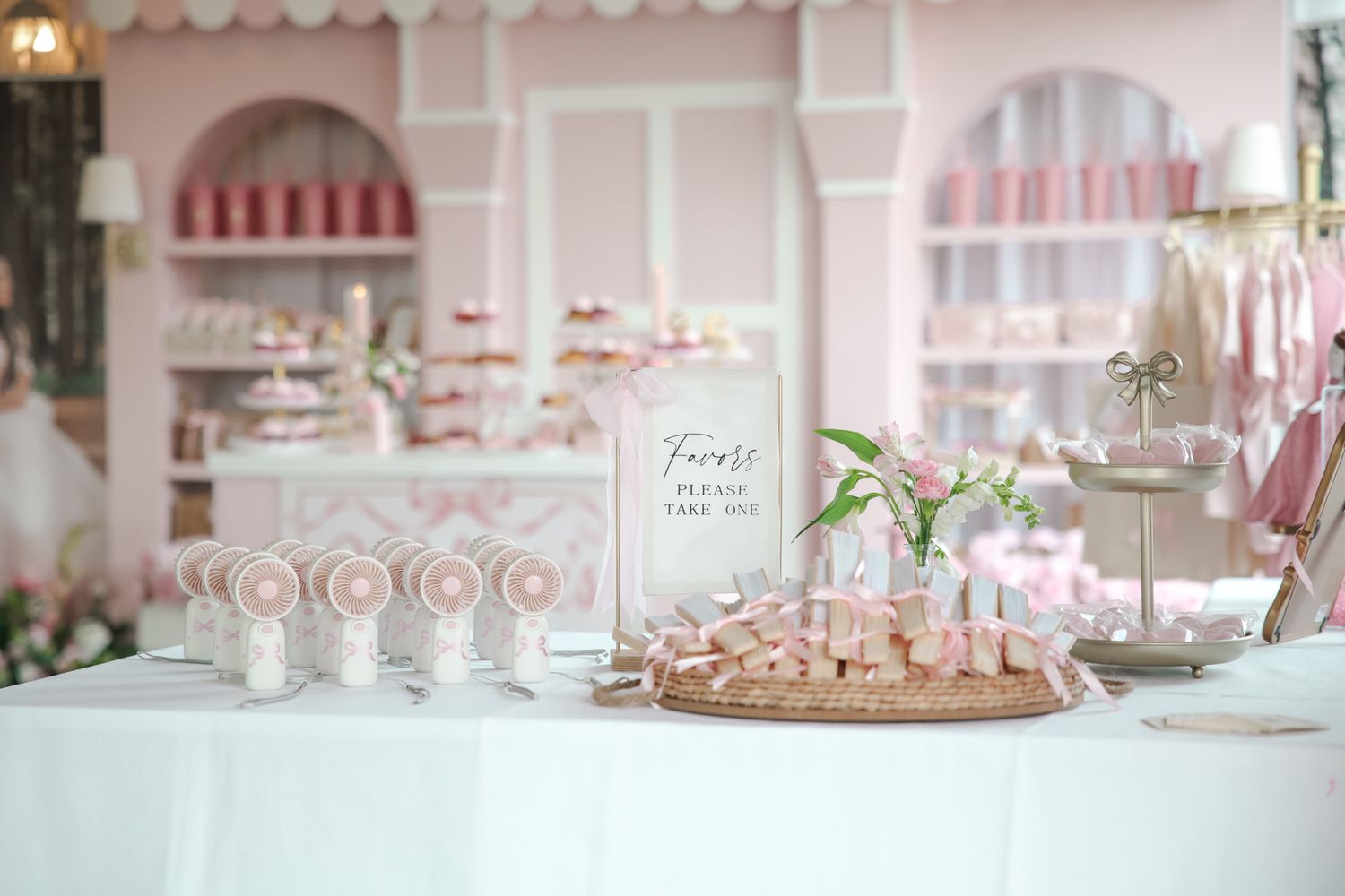 Elegant quinceañera table decor at the Oakland, CA venue, captured in bright natural light.