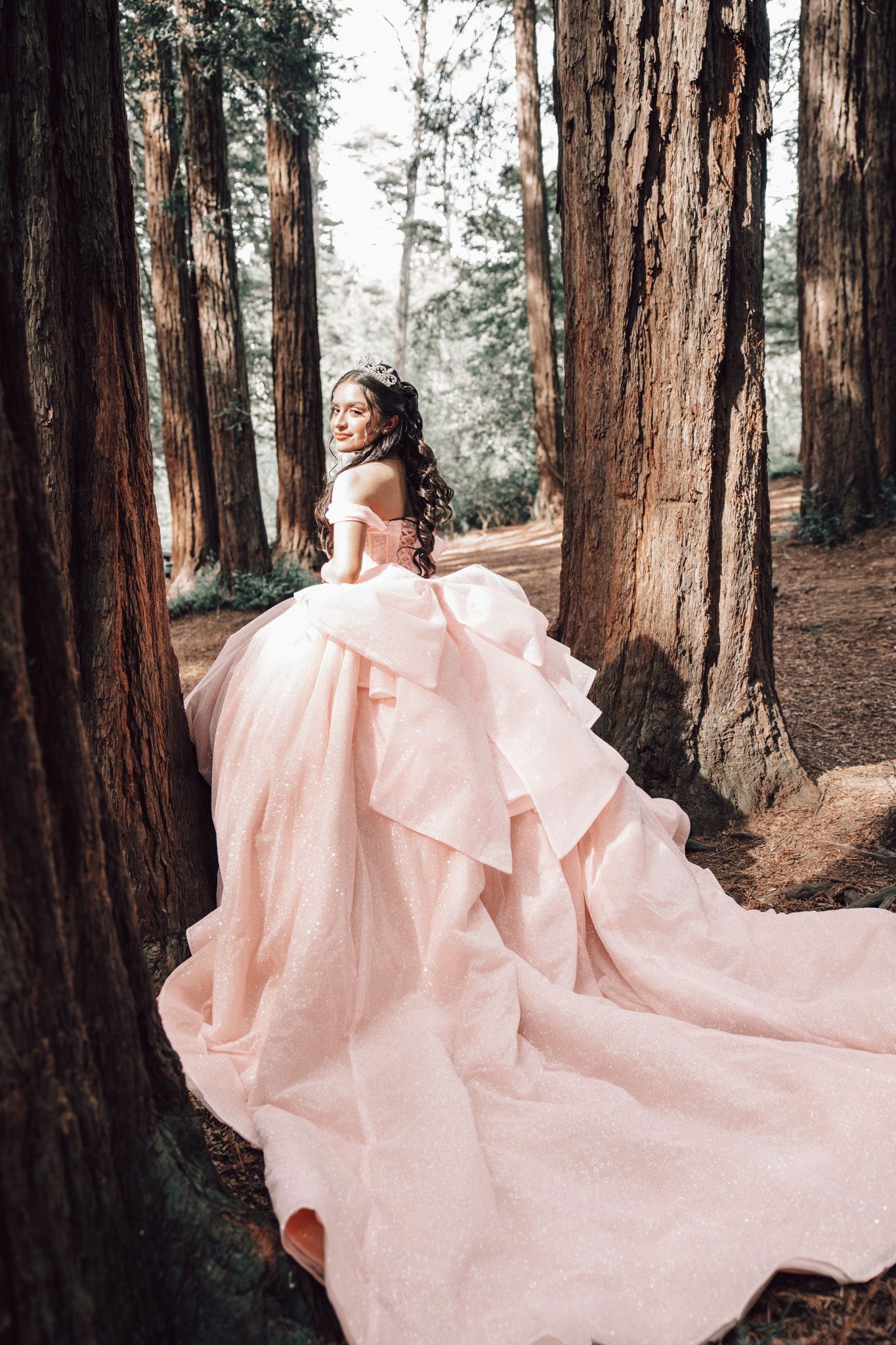 Natural‑light pre‑quince portraits in the Oakland Redwoods, featuring a simple and elegant forest setting.