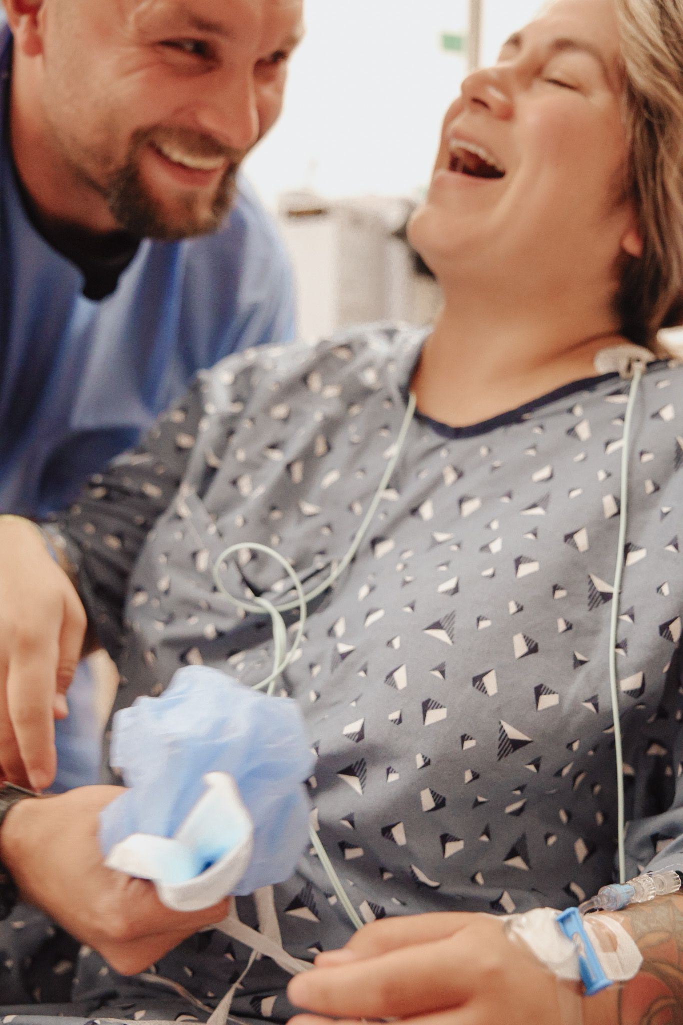 A person laughs while holding a small bottle in a series of sequential photos showing joyful expressions.