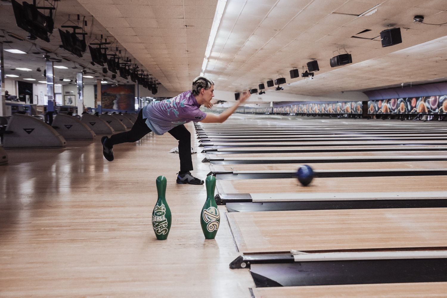 A series of bowling lanes showing different angles of a bowling alley with pins, lanes, and ball returns.