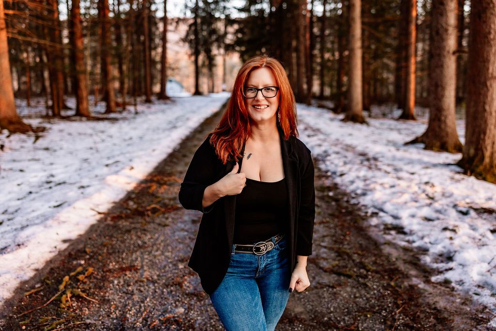 Schuylkill County motherhood and family photographer walking on a forest path during a natural light outdoor branding session