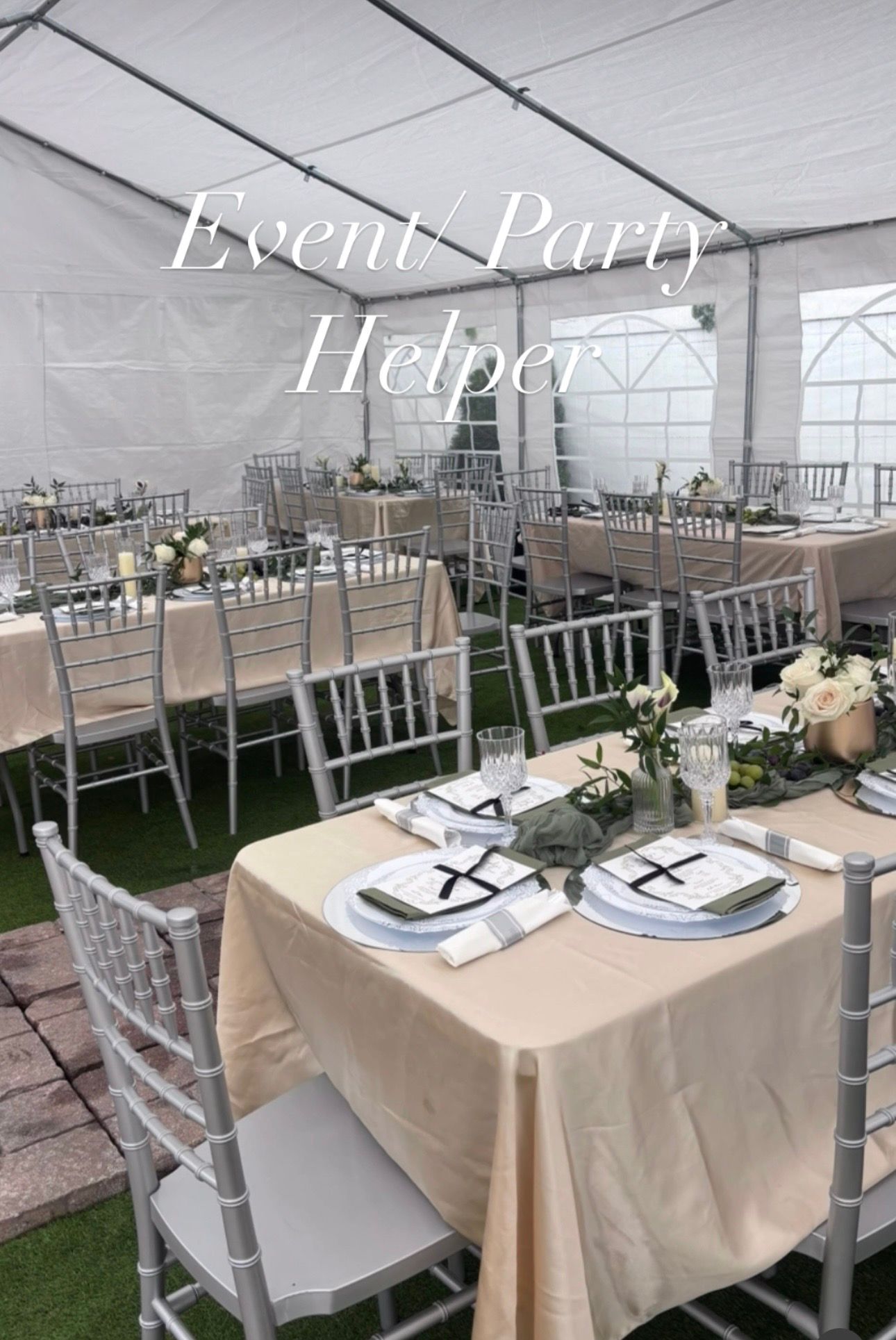 Elegant event tent setup with silver chiavari chairs and champagne tablecloths for a wedding or party reception.