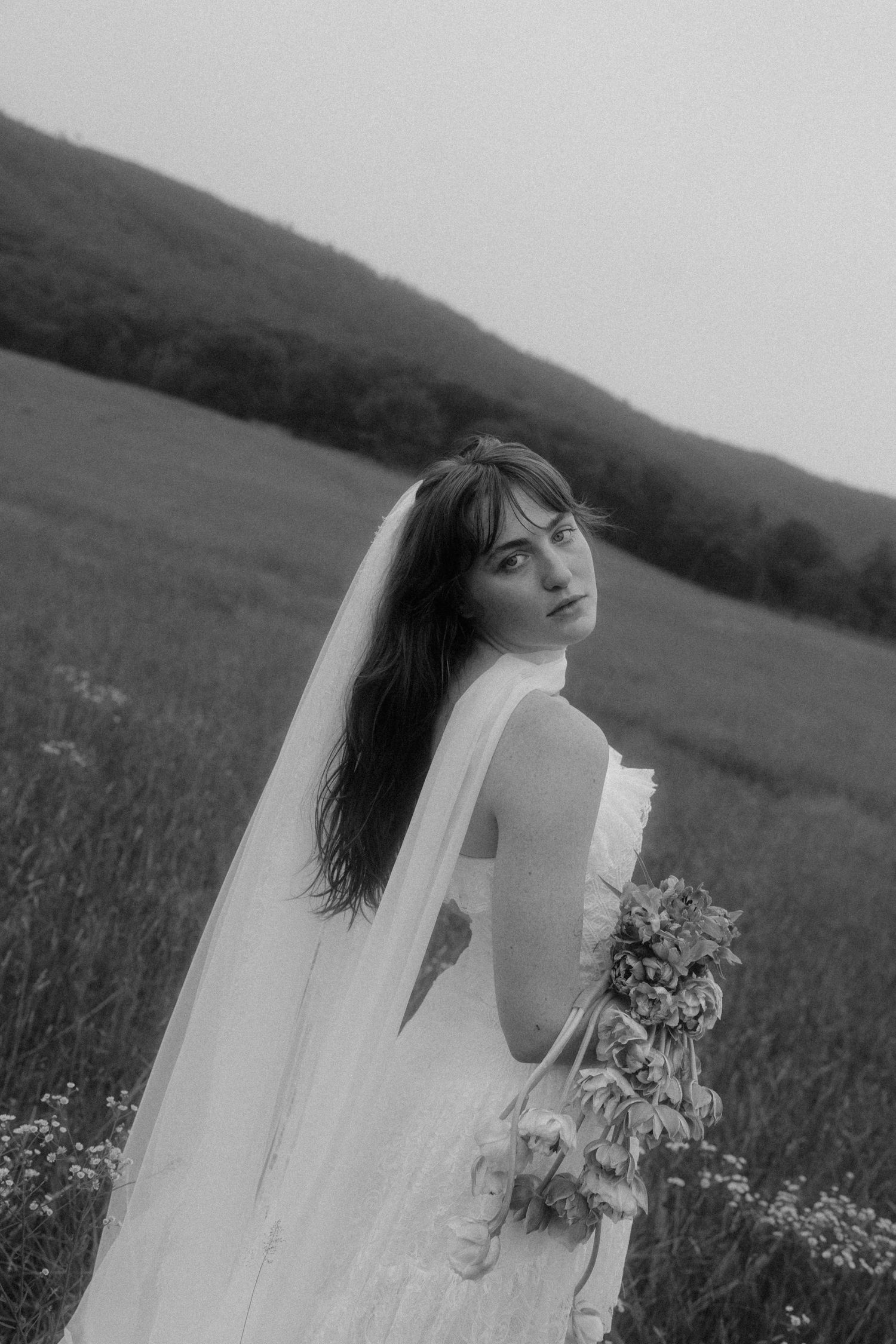 Warm, cinematic photography with an editorial edge. North Georgia wedding and portrait photographer capturing authentic, story-driven moment