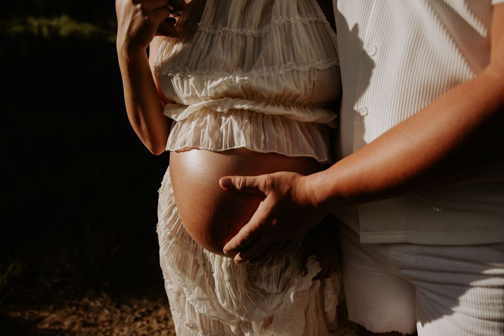 Soft-focused detail shots of white fabric in natural lighting.