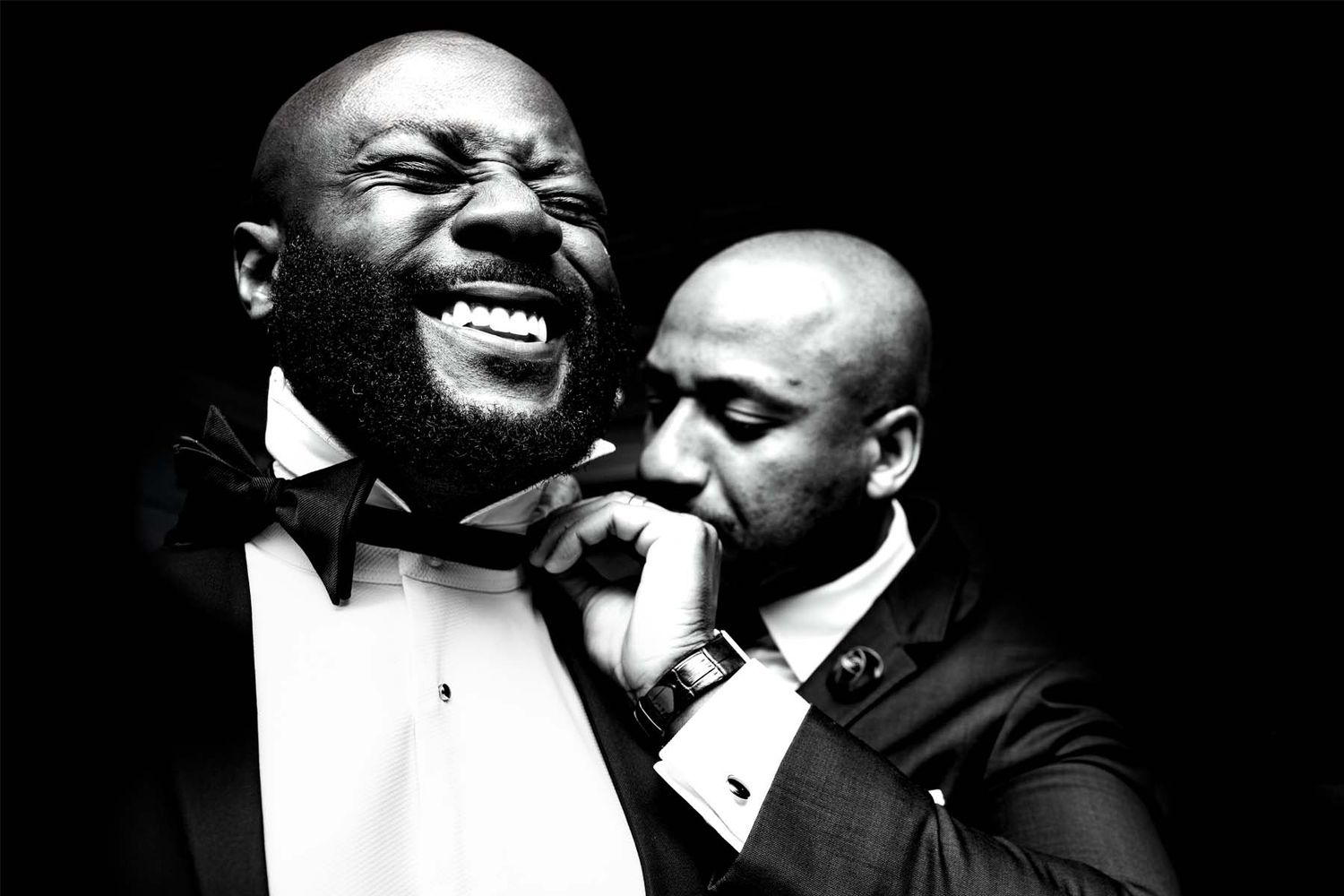 Black and white emotional wedding moments captured in dramatic lighting.