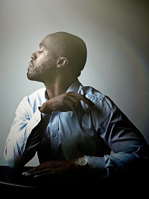 Artistic black and white portrait series showing contemplative poses in dim lighting.