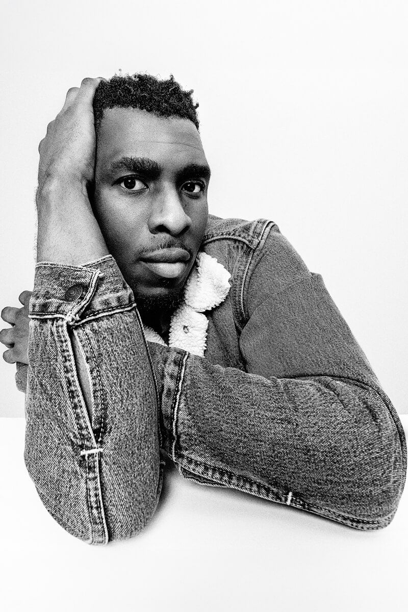 Artistic black and white portraits showing contemplative poses against white background.