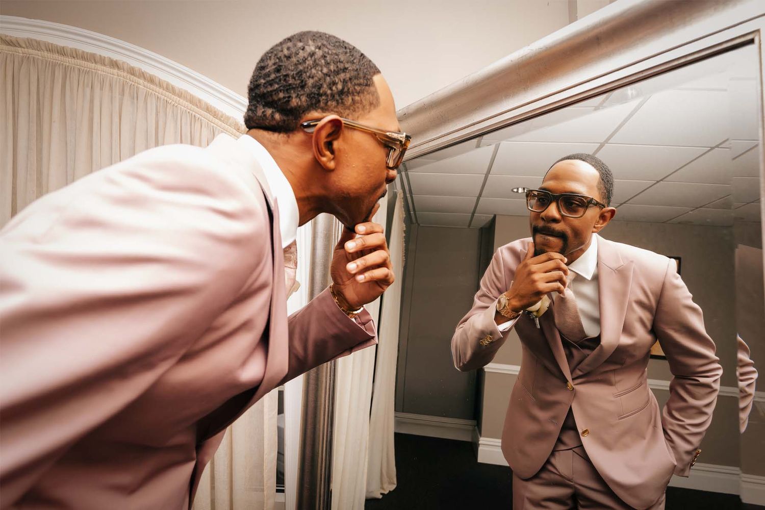 Series of candid getting ready moments in pink formal attire.