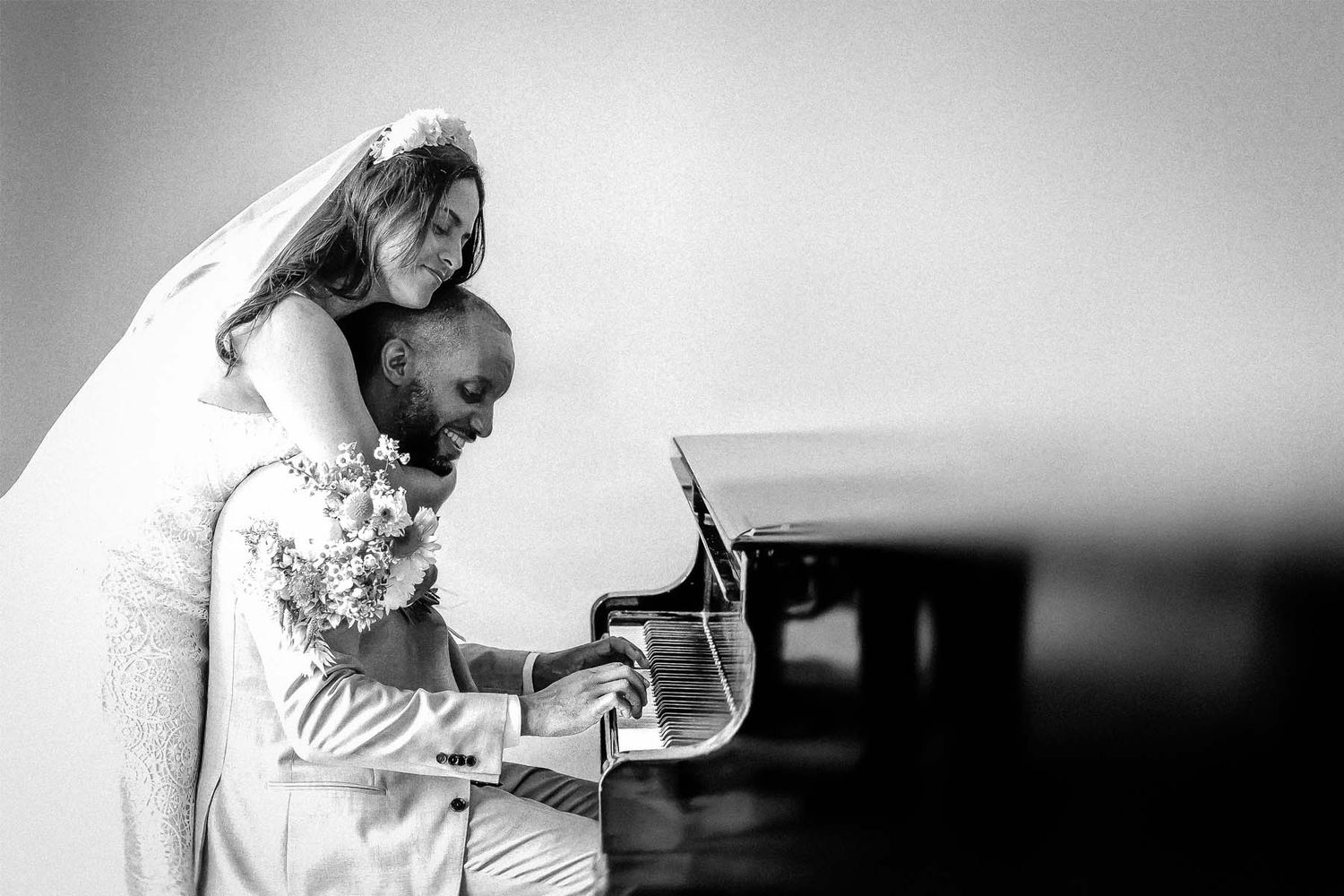 Black and white artistic sequence showing intimate wedding moments in close-up shots.