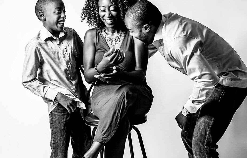 Black and white photo series showing candid family interactions and laughter.