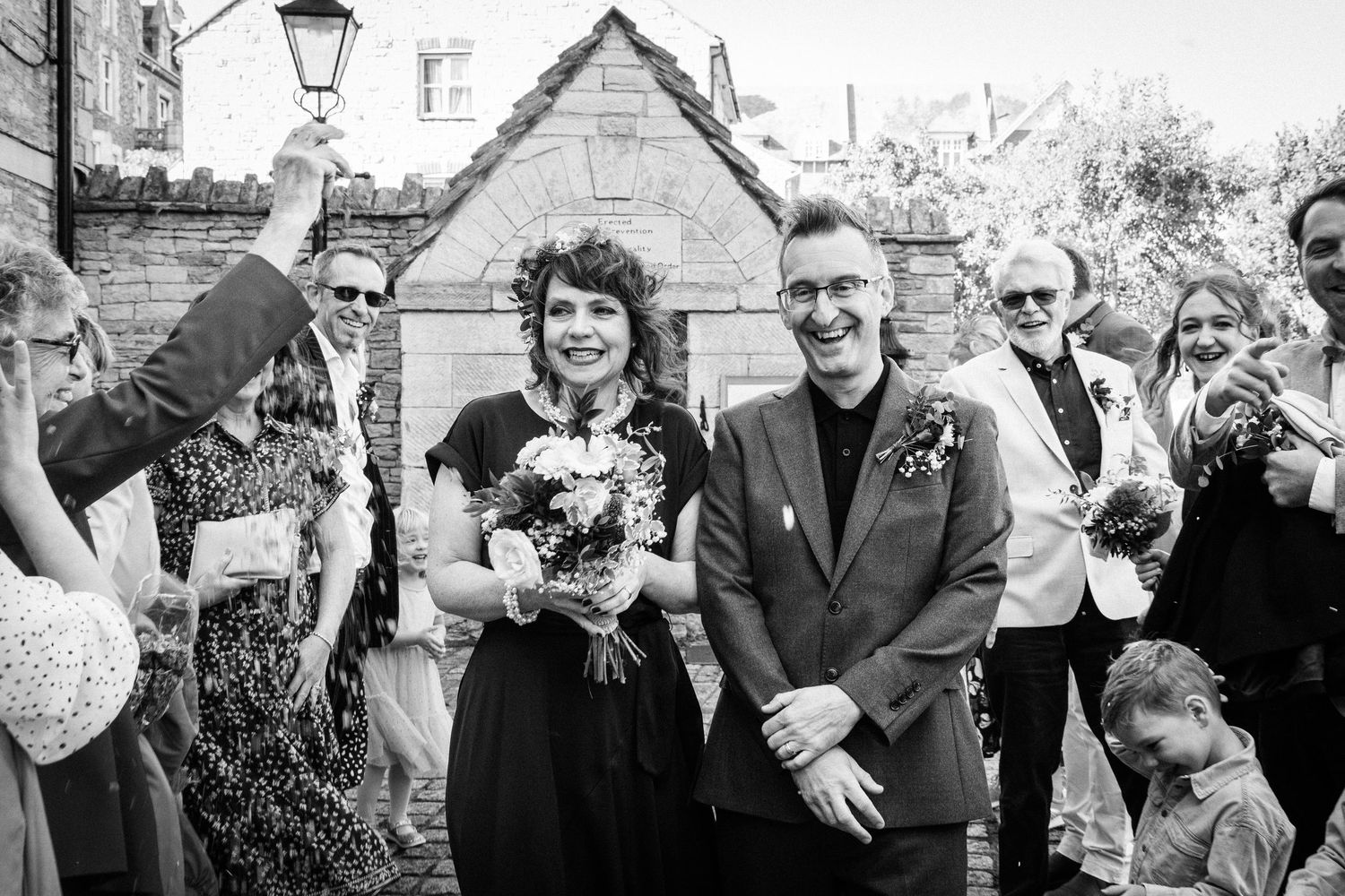 Bride and Groom outside Swanage Town Hall after their wedding ceremony, Dorset coastal wedding photography.