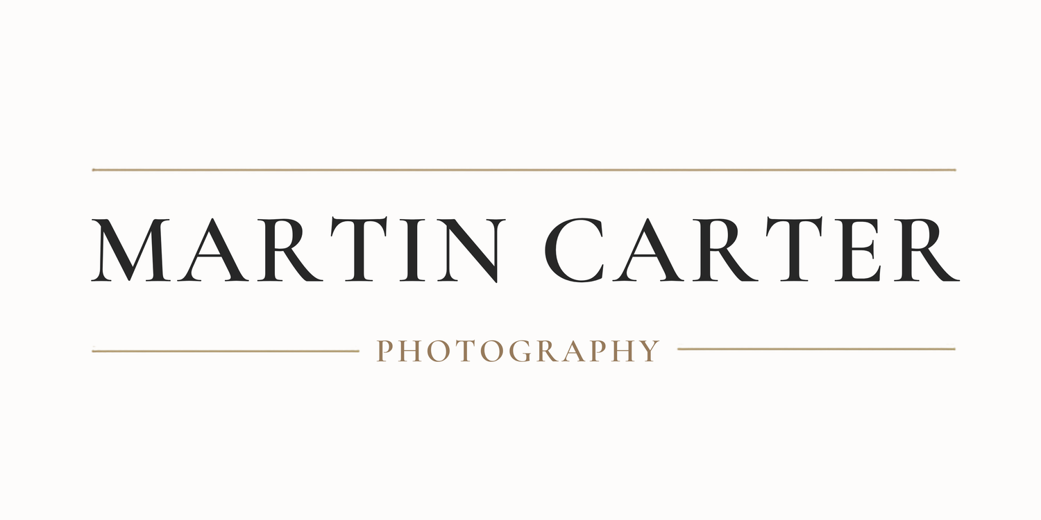 Martin Carter Photography logo with elegant serif font on cream background with gold decorative lines.