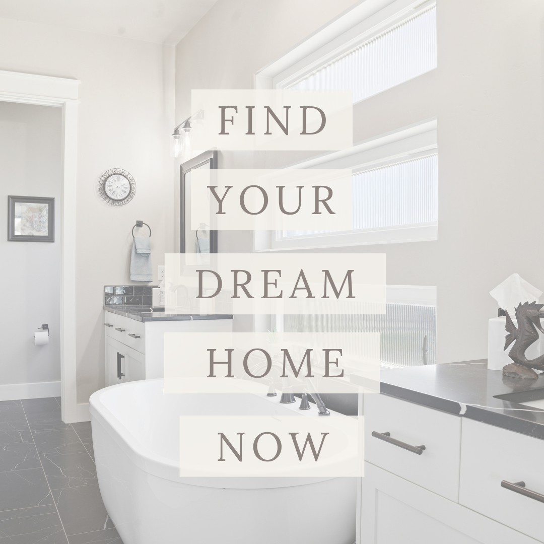 Modern bathroom with freestanding tub and white cabinetry featuring a Find Your Dream Home Now real estate promotional overlay.