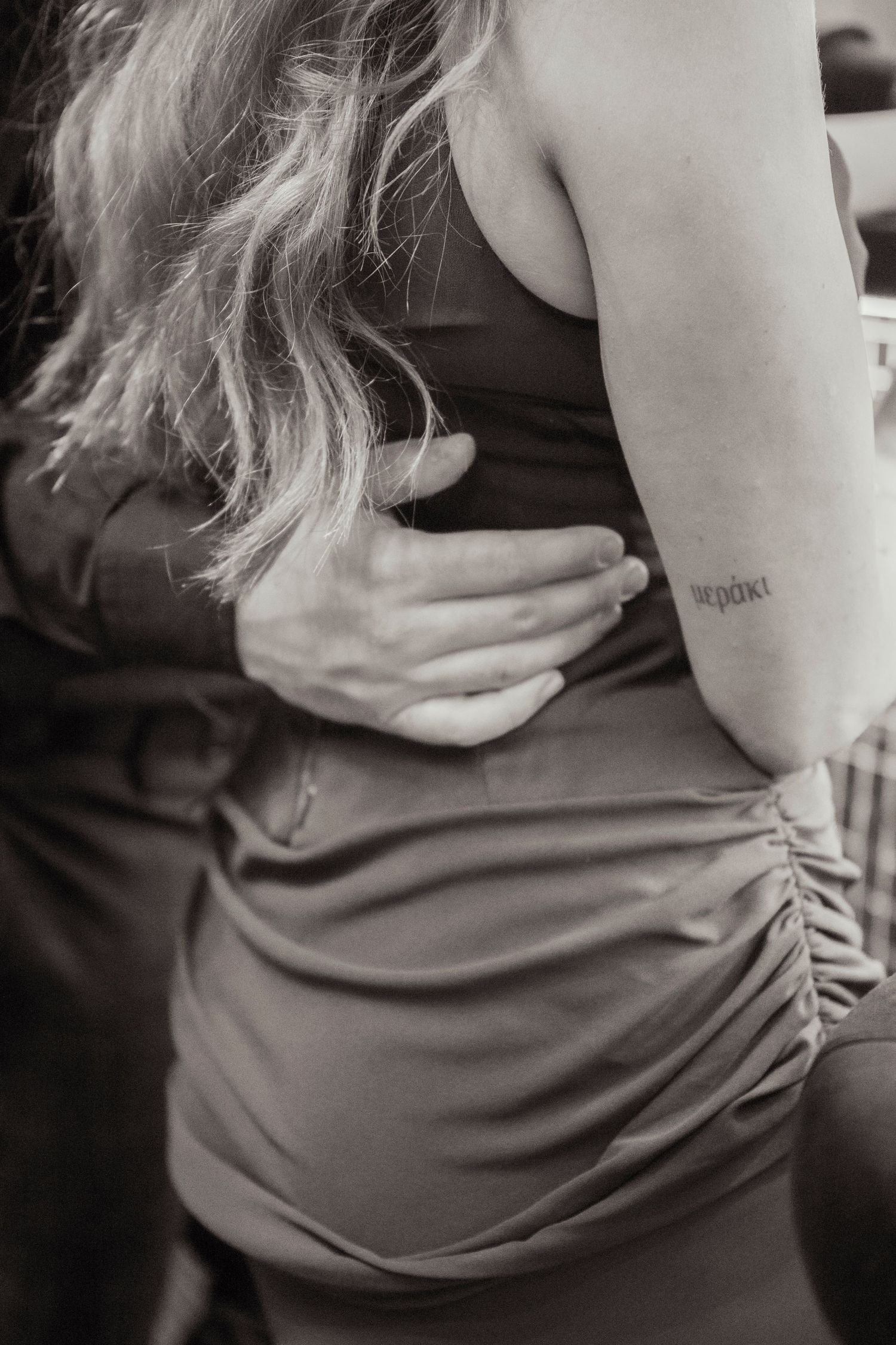 Intimate engagement portraits in a cosy Melbourne city bar.