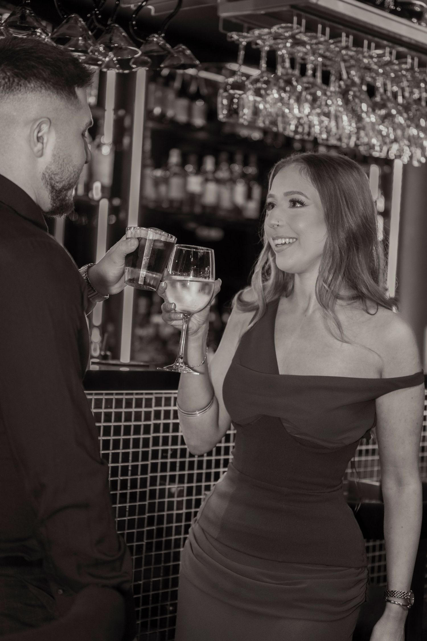 Intimate engagement portraits in a cosy Melbourne city bar.