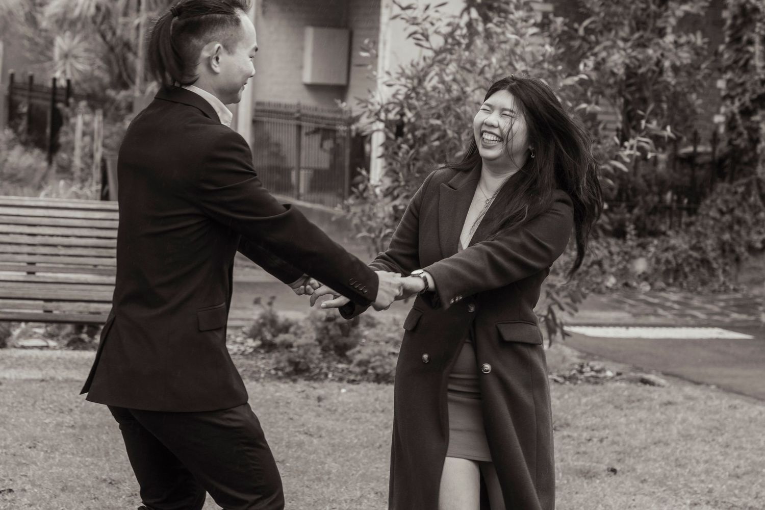 Couple wandering through the streets of Fitzroy during their Melbourne engagement session.