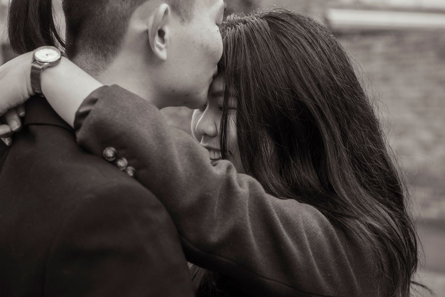 Couple wandering through the streets of Fitzroy during their Melbourne engagement session.