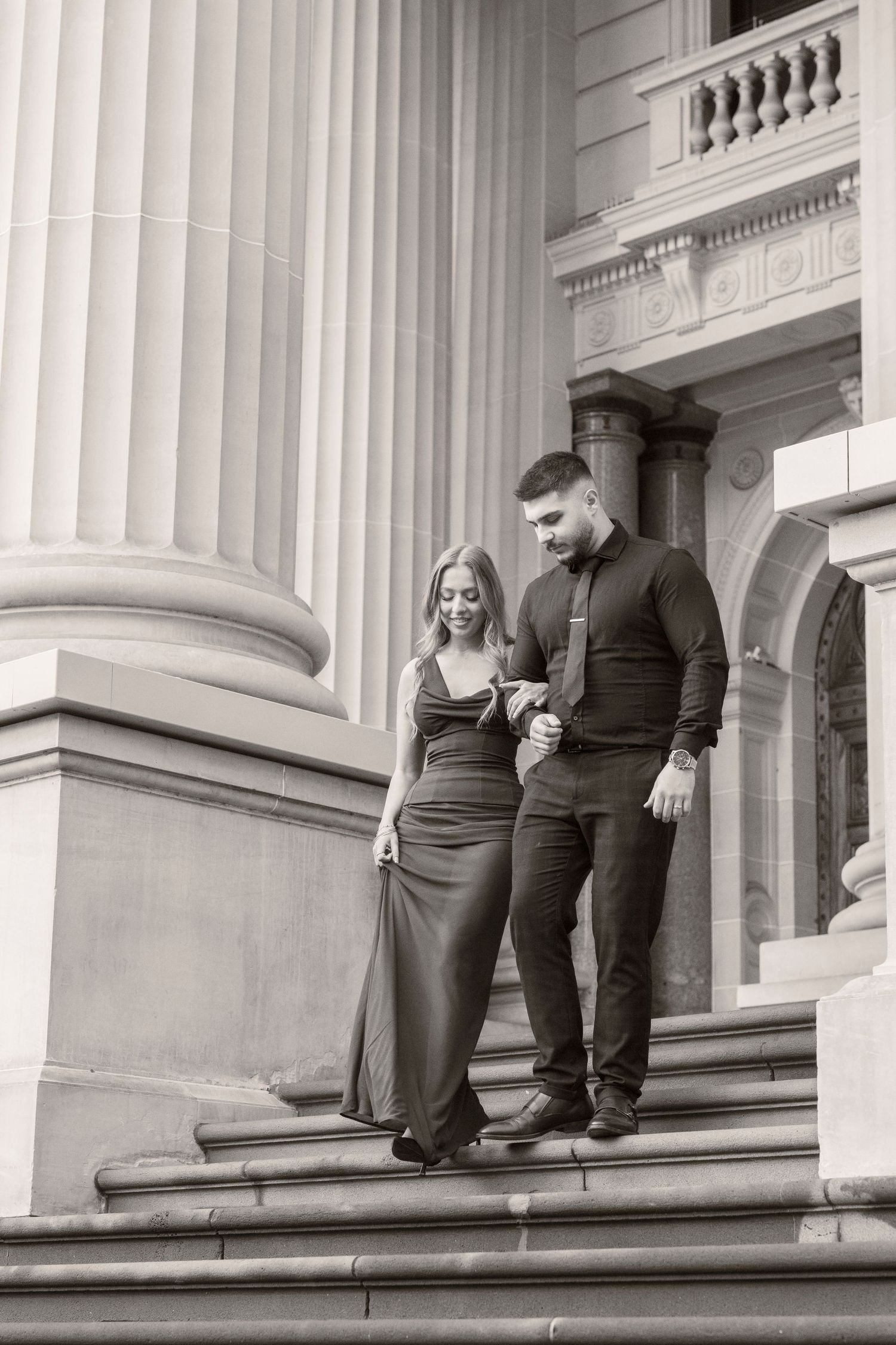 Editorial-style engagement portraits outside Parliament House in Melbourne.