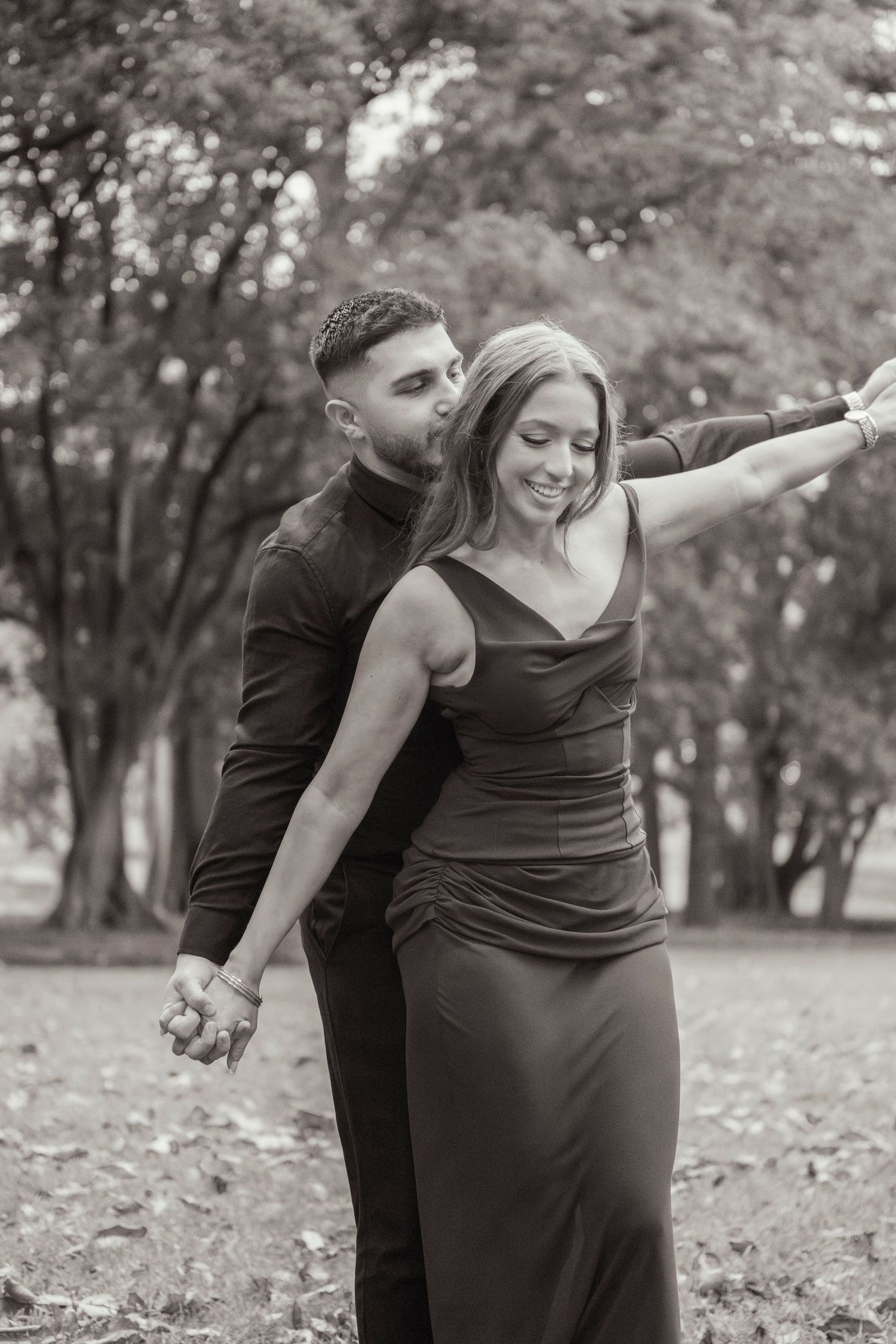 Editorial-style engagement portraits outside Parliament House in Melbourne.