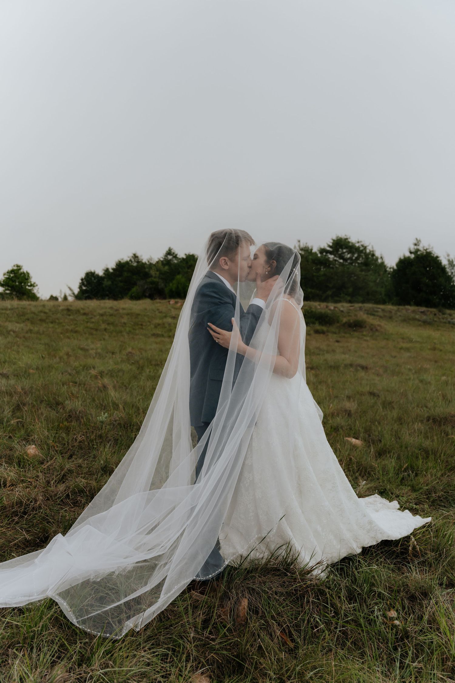 Mountain wedding portraits in the rain at @Boshoek in Mpumalanga
