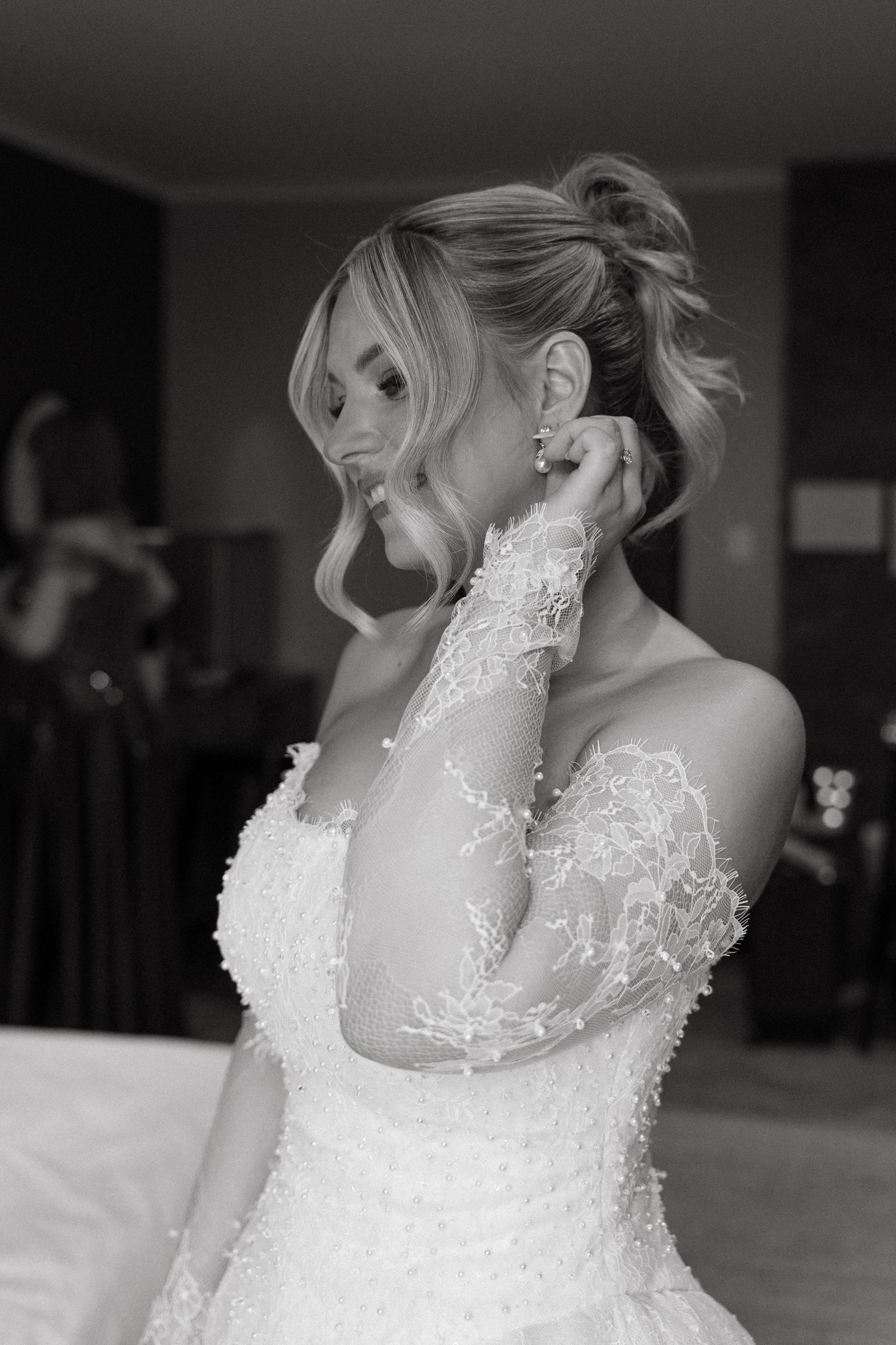 Close-up black and white photos of a bride's lace wedding dress collar details from different angles.