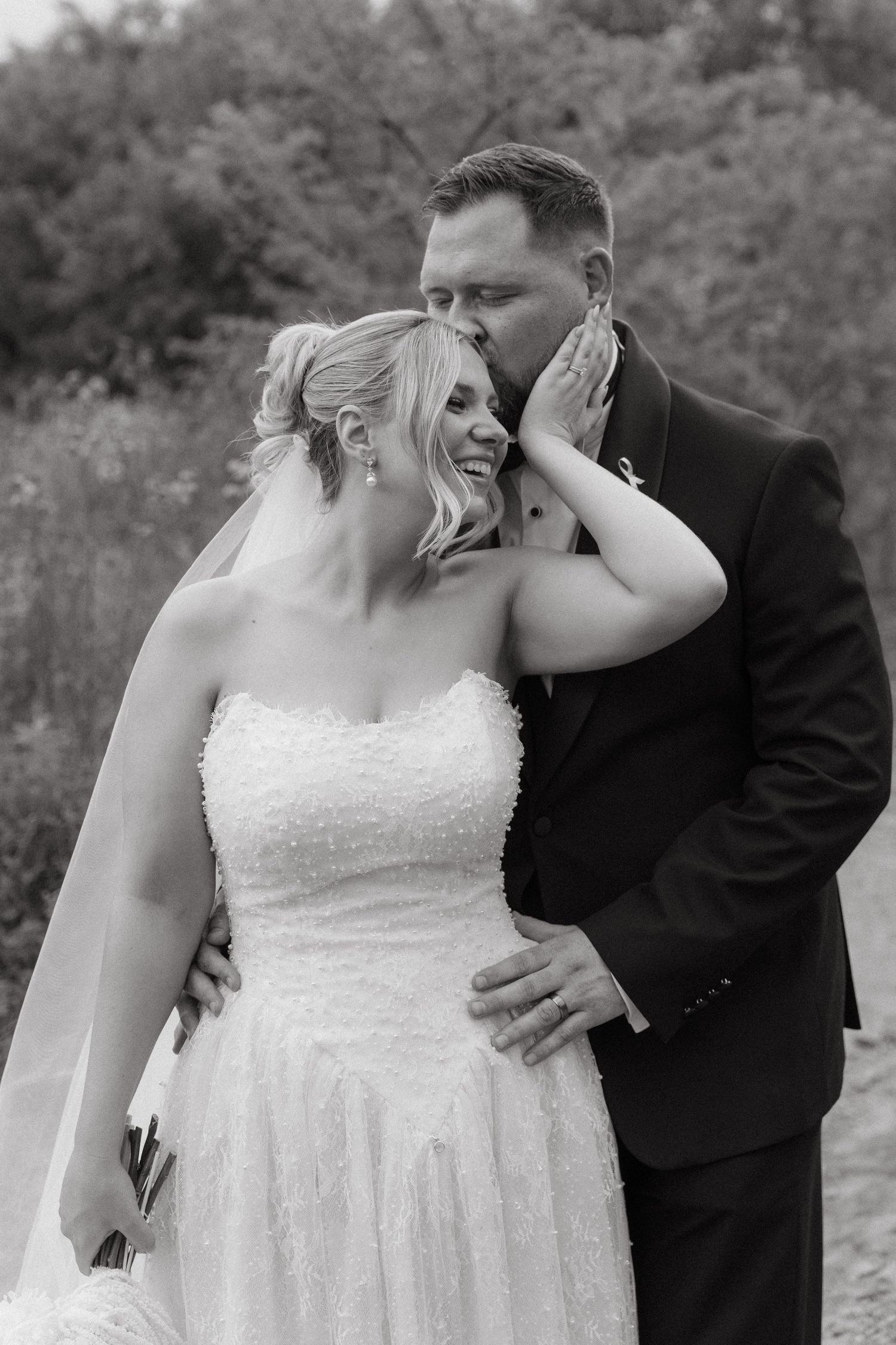 A romantic black and white photo sequence shows a couple sharing intimate moments during their outdoor wedding photoshoot.