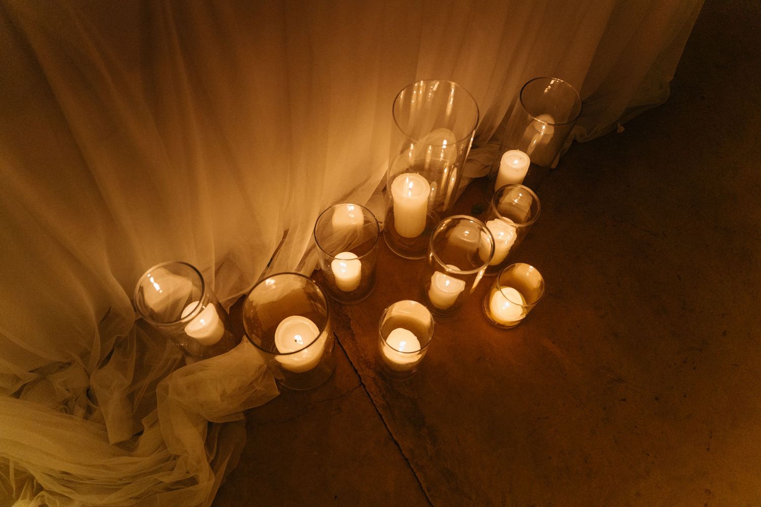 String lights create a warm ambiance in a dimly lit room with decorative elements.