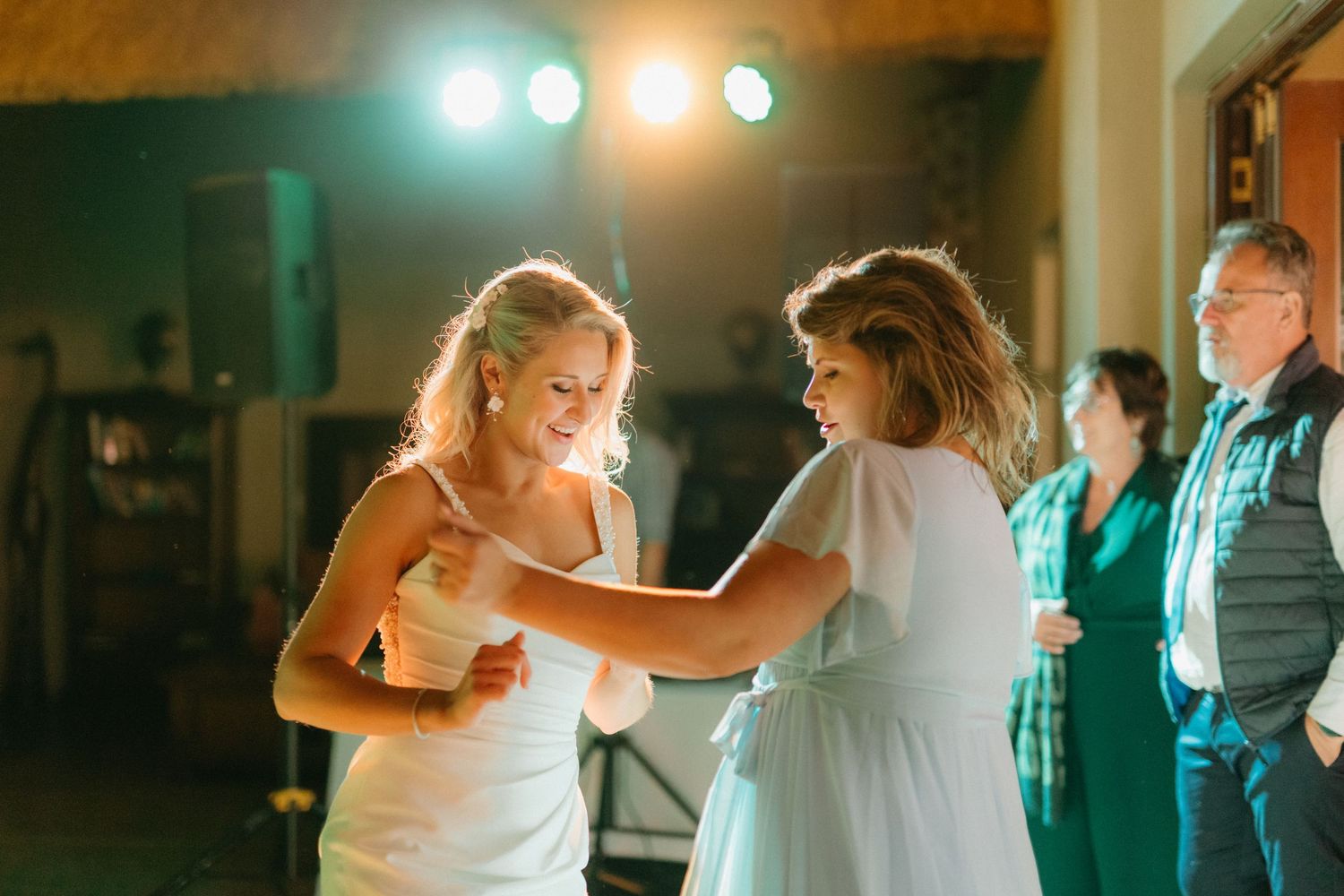 A sequence of candid wedding preparation photos with warm and cool lighting showing pre-ceremony moments.