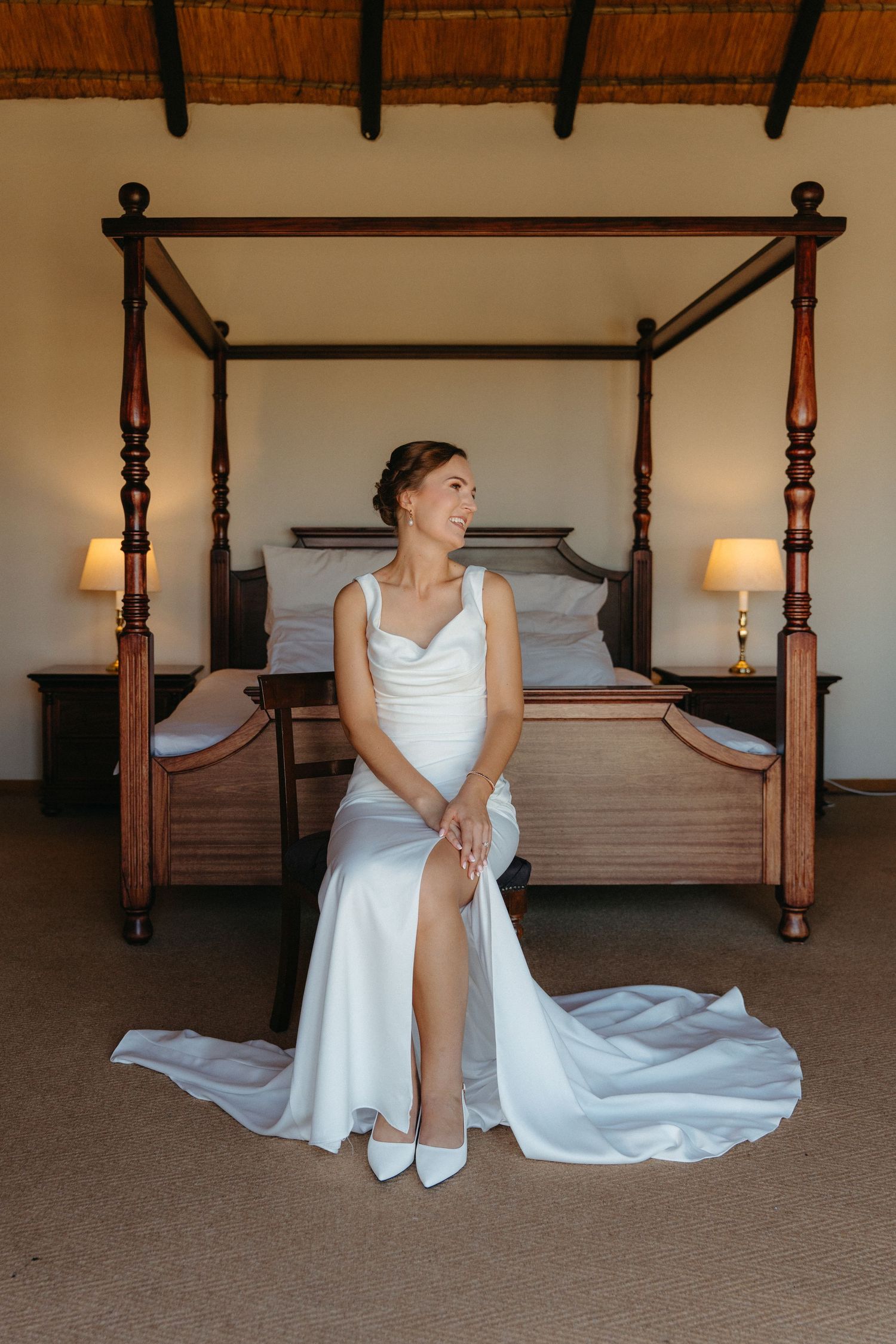 A series of elegant photos showing a white wedding dress flowing around a four-poster bed in a rustic bedroom setting.