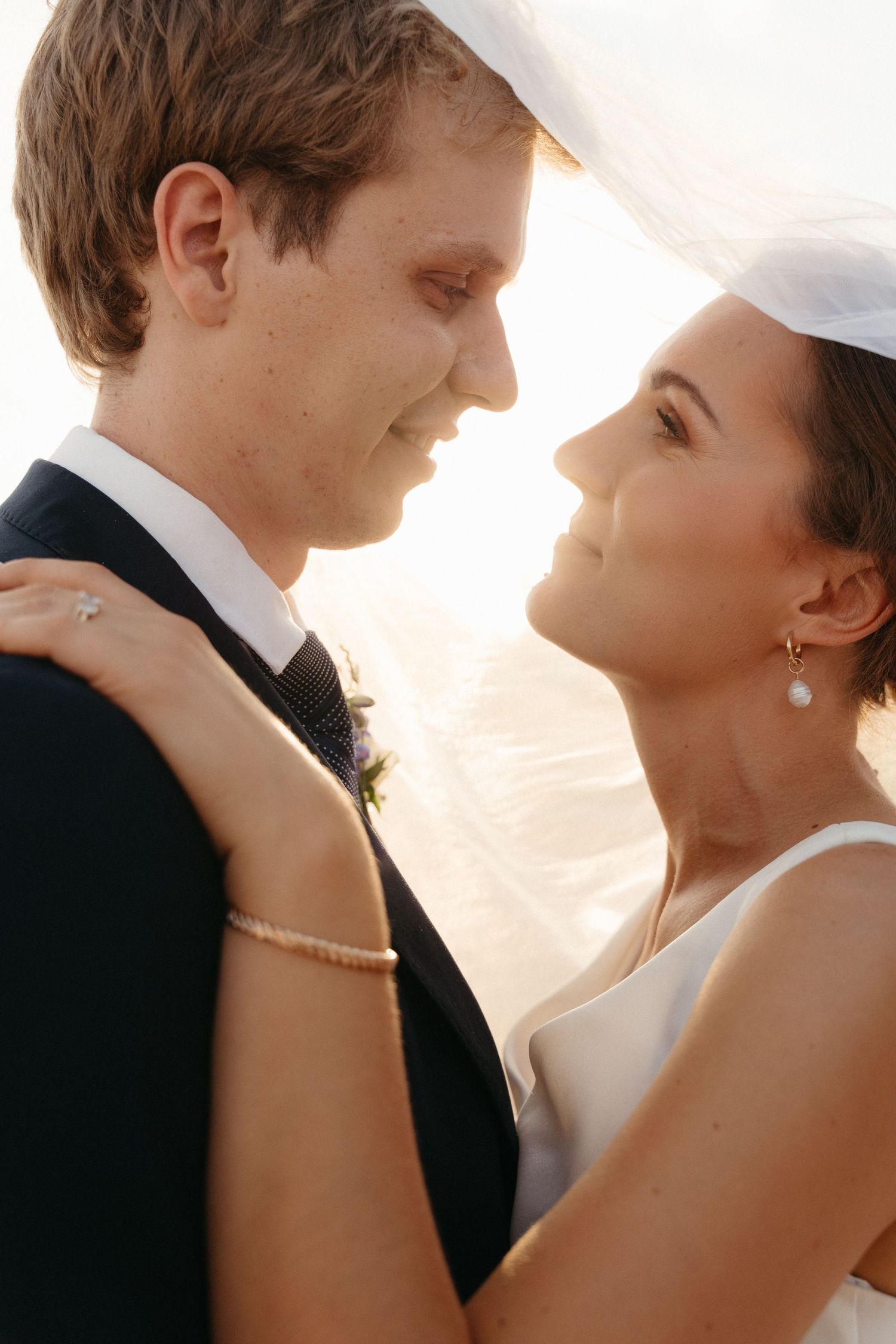 Intimate wedding dance moment captured in a series of close-up profile shots.