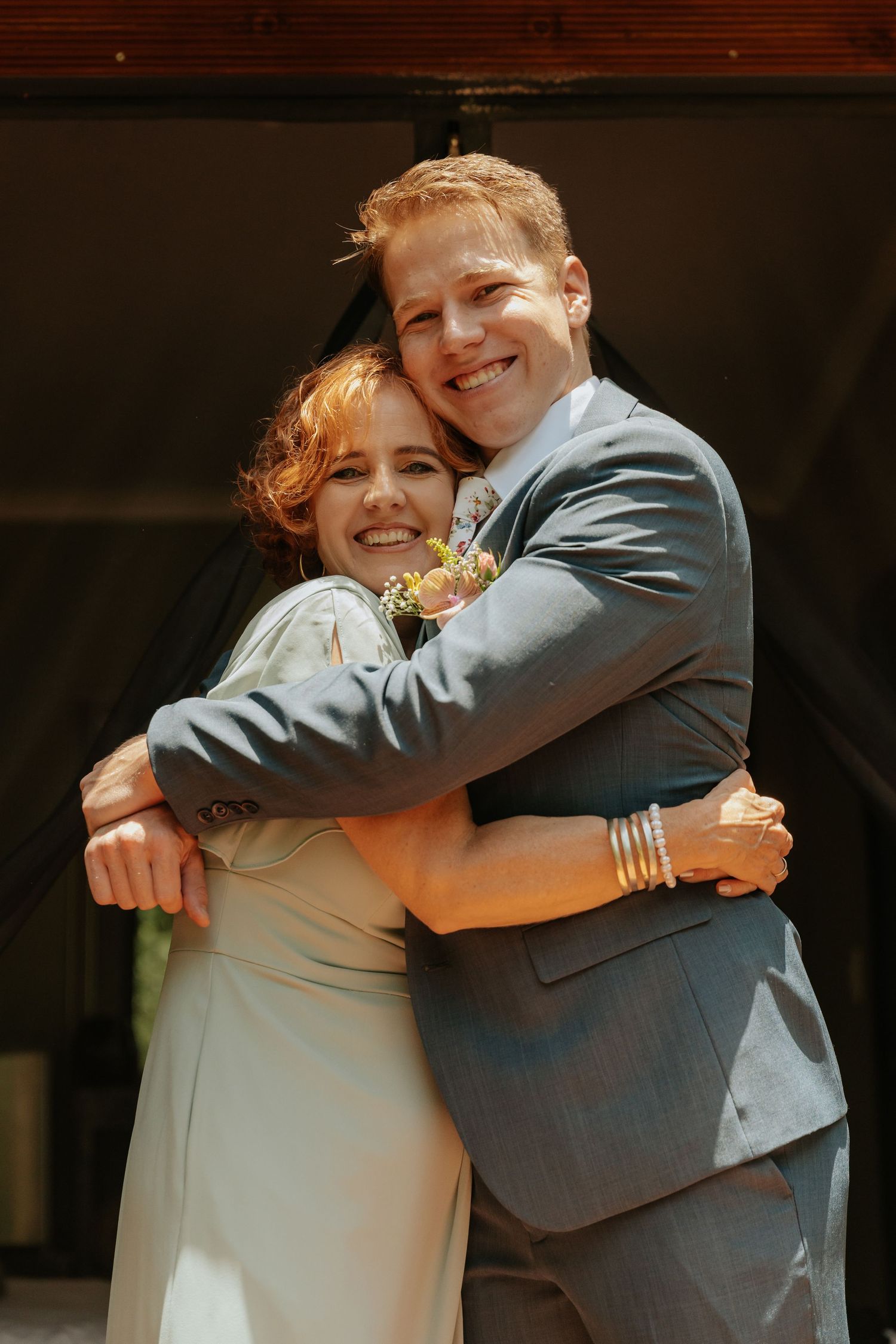 Groom and his mom embrace at a wedding in Mpumalanga, South africa