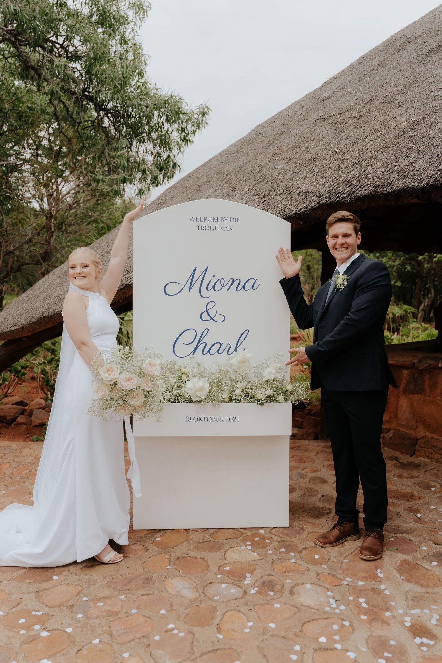 Wedding welcome sign reveal sequence with elegant blue calligraphy on white background.