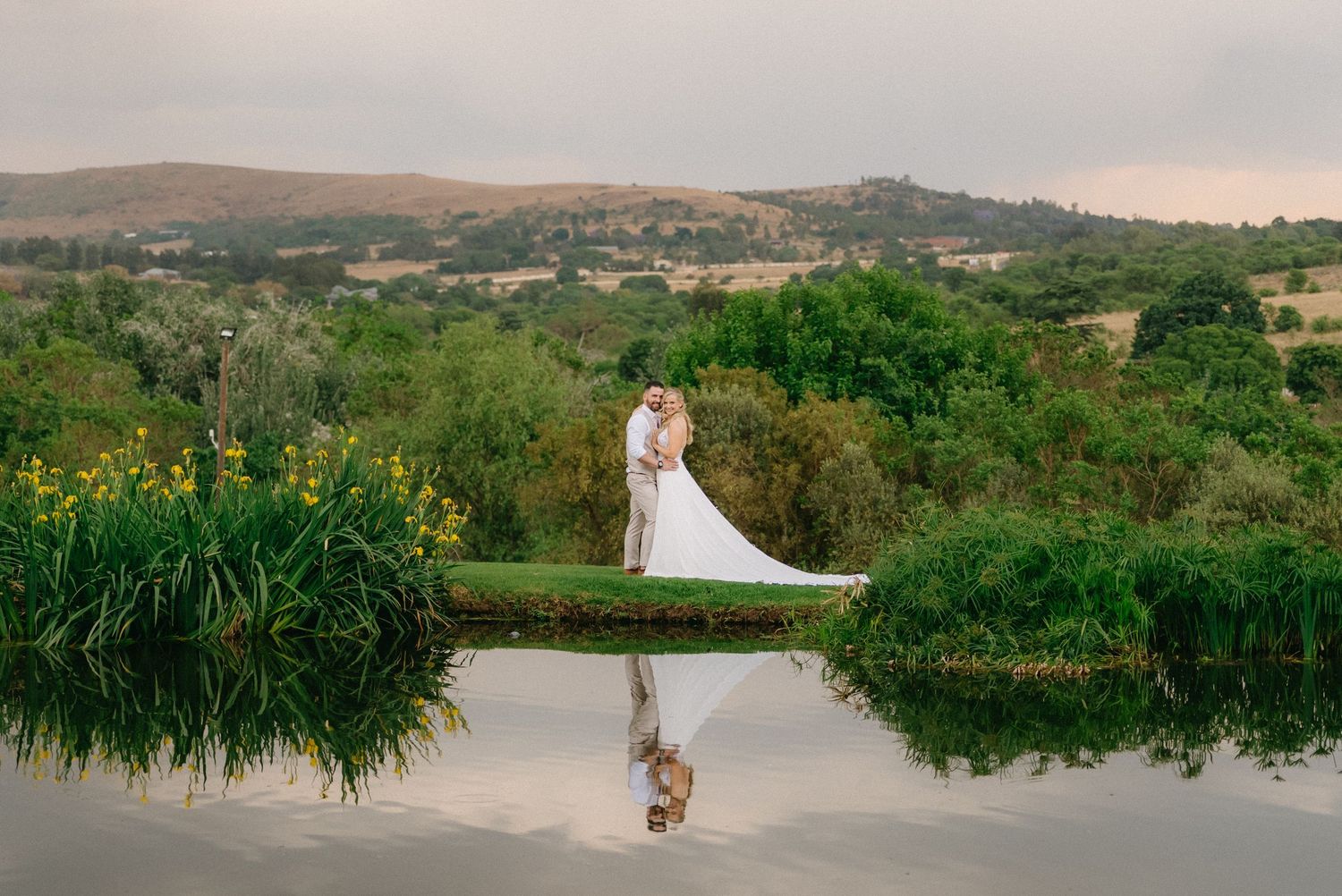 A wedding photo series showing a couple in a scenic outdoor setting with rolling hills and greenery at sunset.
