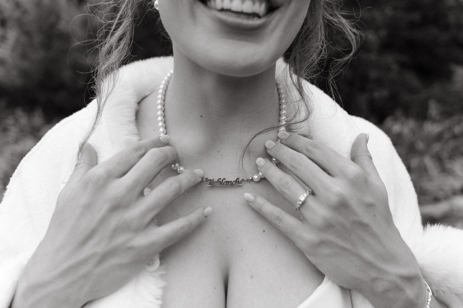 Black and white candid wedding photos showing joyful reactions and expressions during celebration.