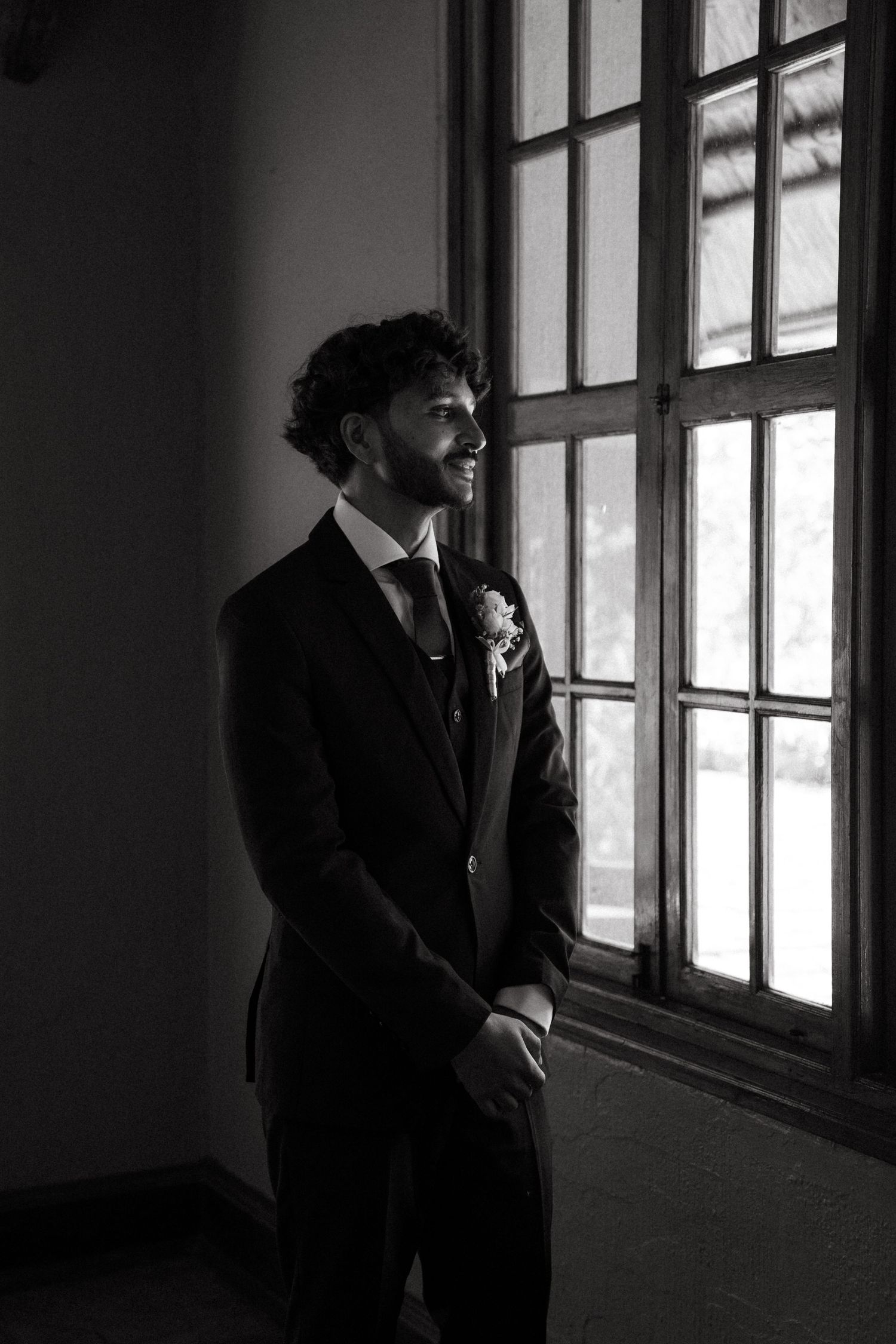 A dramatic black and white photo sequence shows a silhouette against windows in moody lighting.