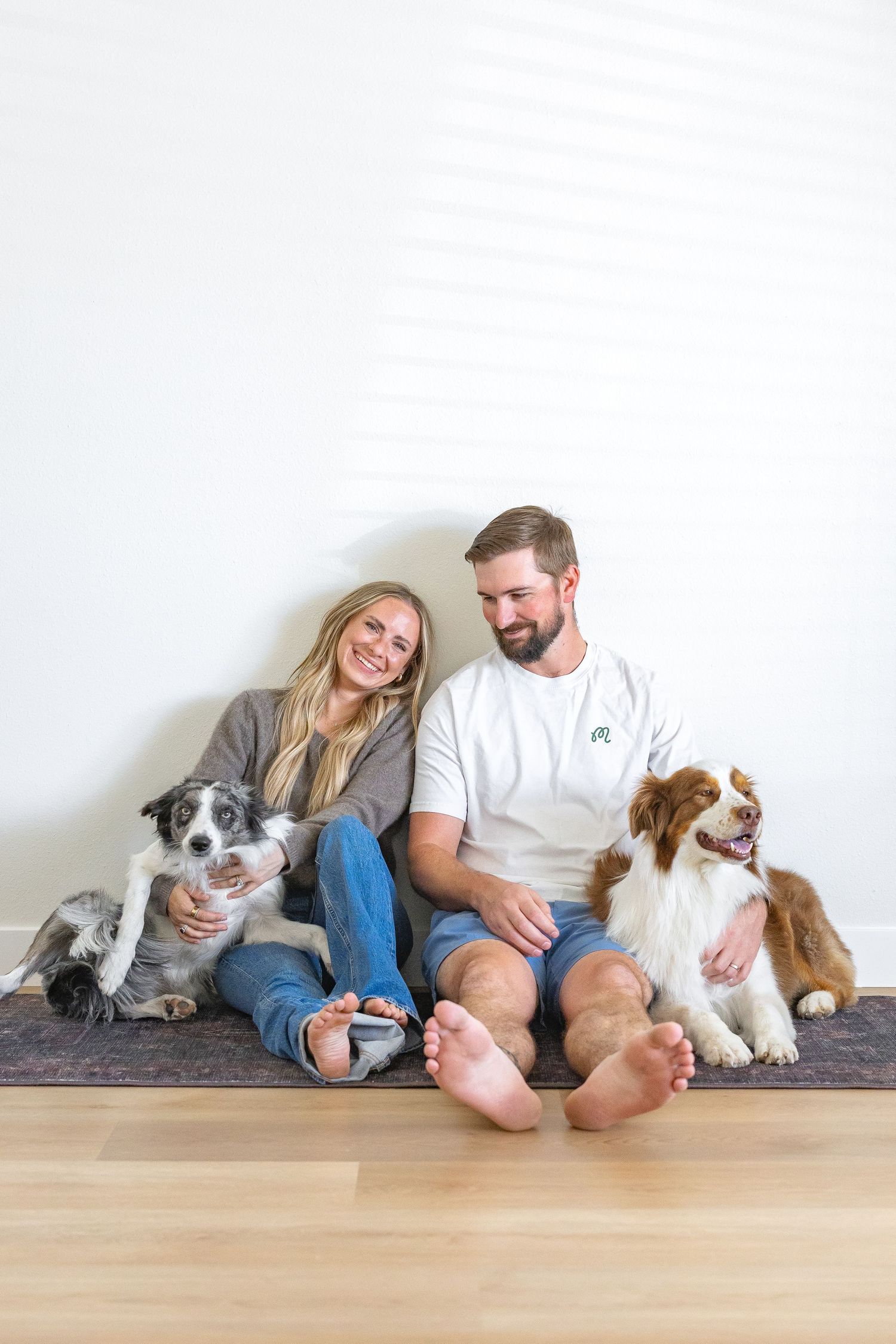 Couple with their dogs during a lifestyle photography session in Arizona